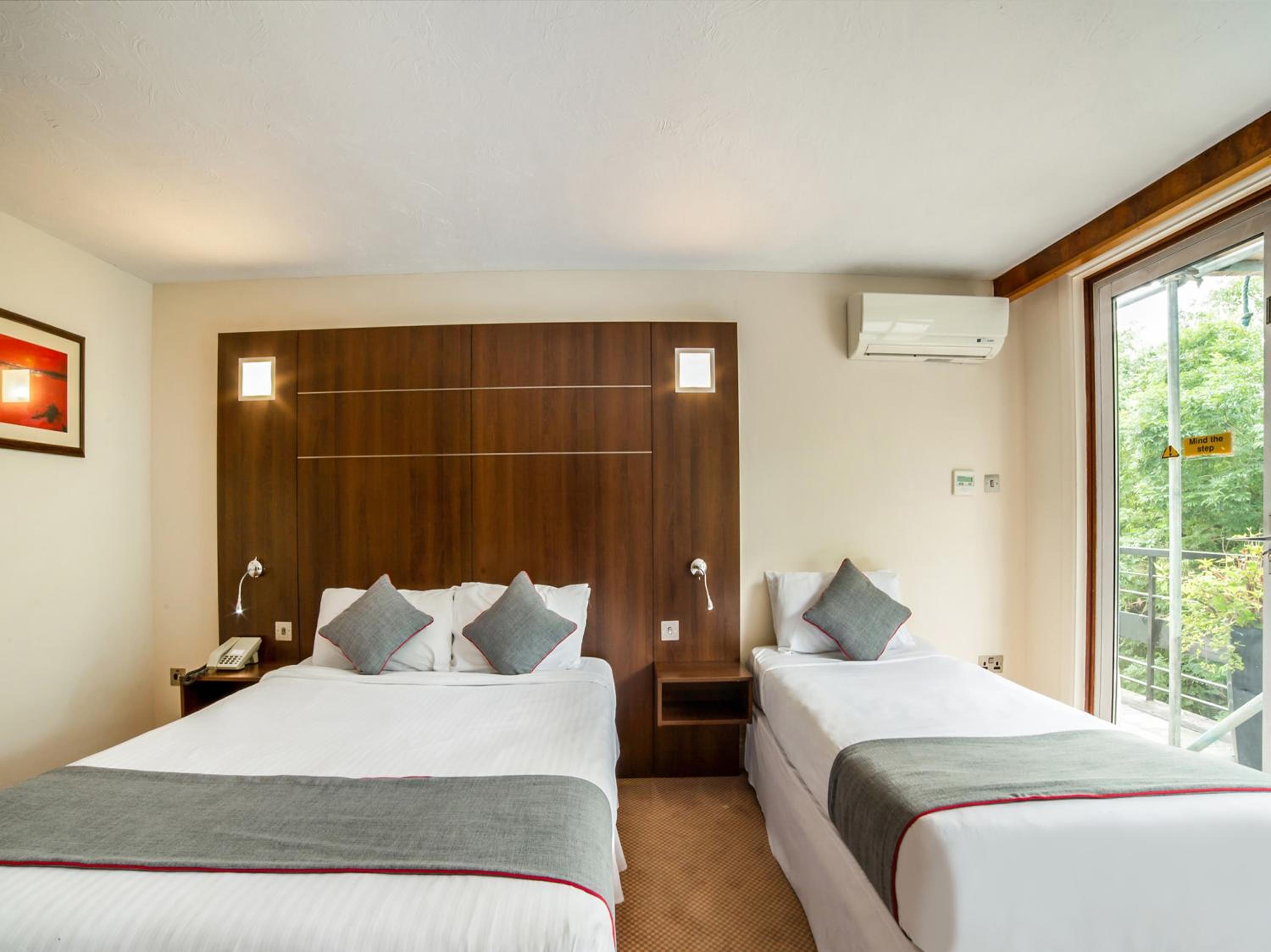 Deluxe Triple Room - Photo 9
