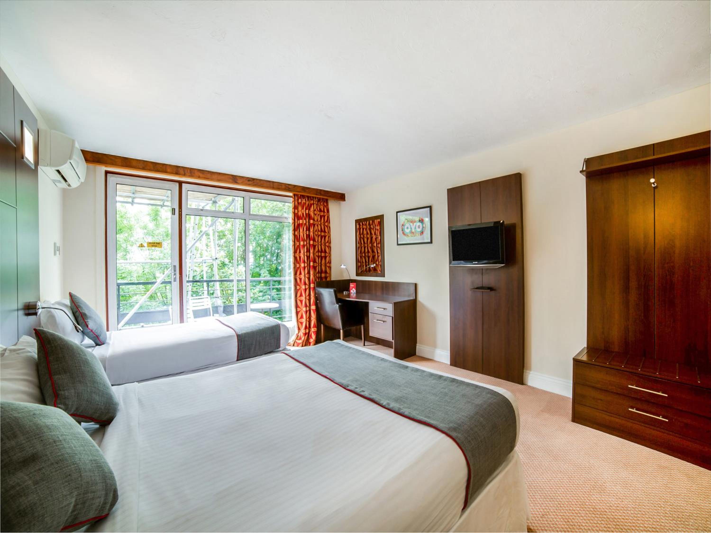 Deluxe Triple Room - Photo 10
