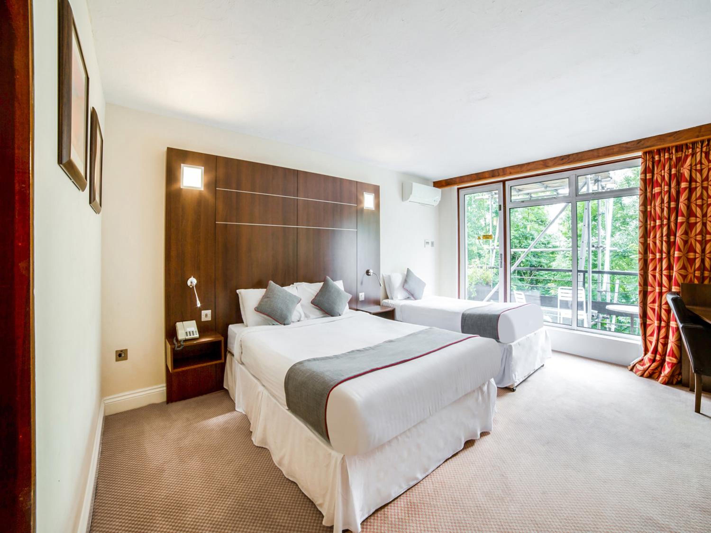 Deluxe Triple Room - Photo 1