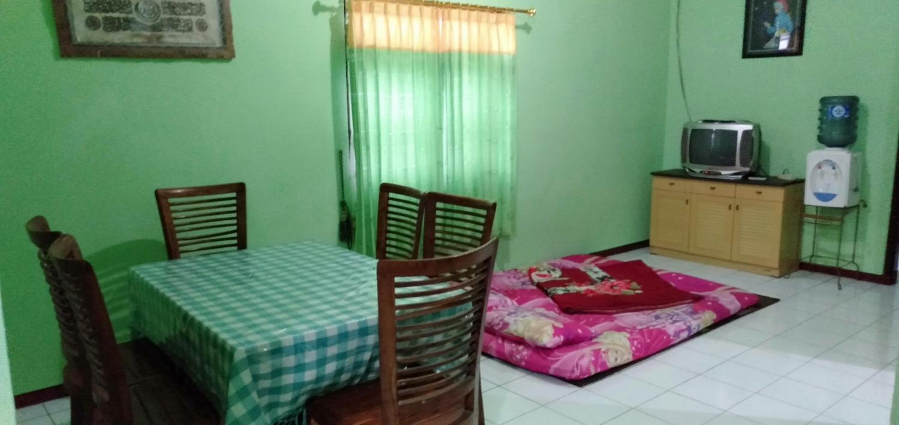 Three-Bedroom House - Photo 16