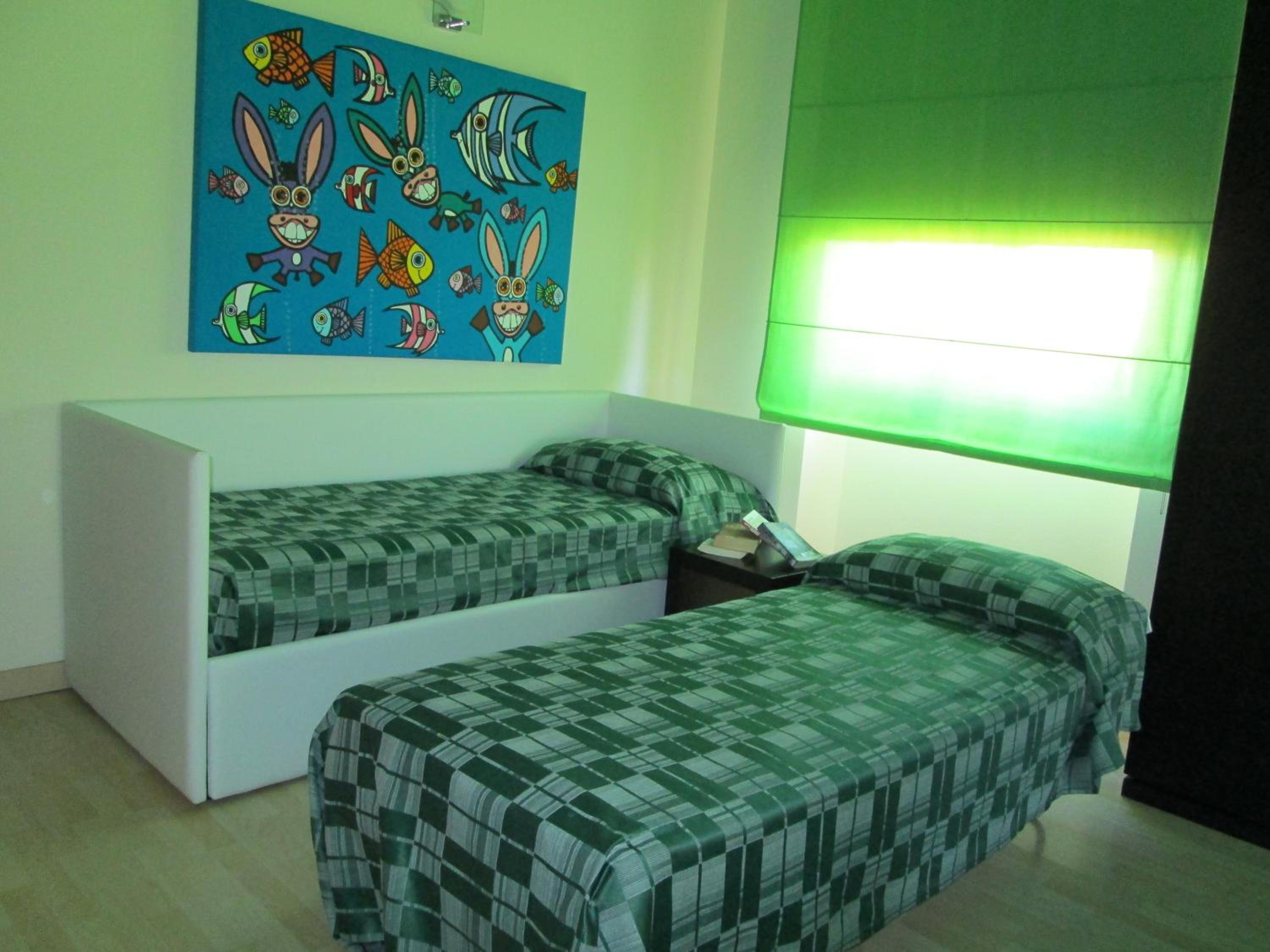 Quadruple Room with Balcony photo 2
