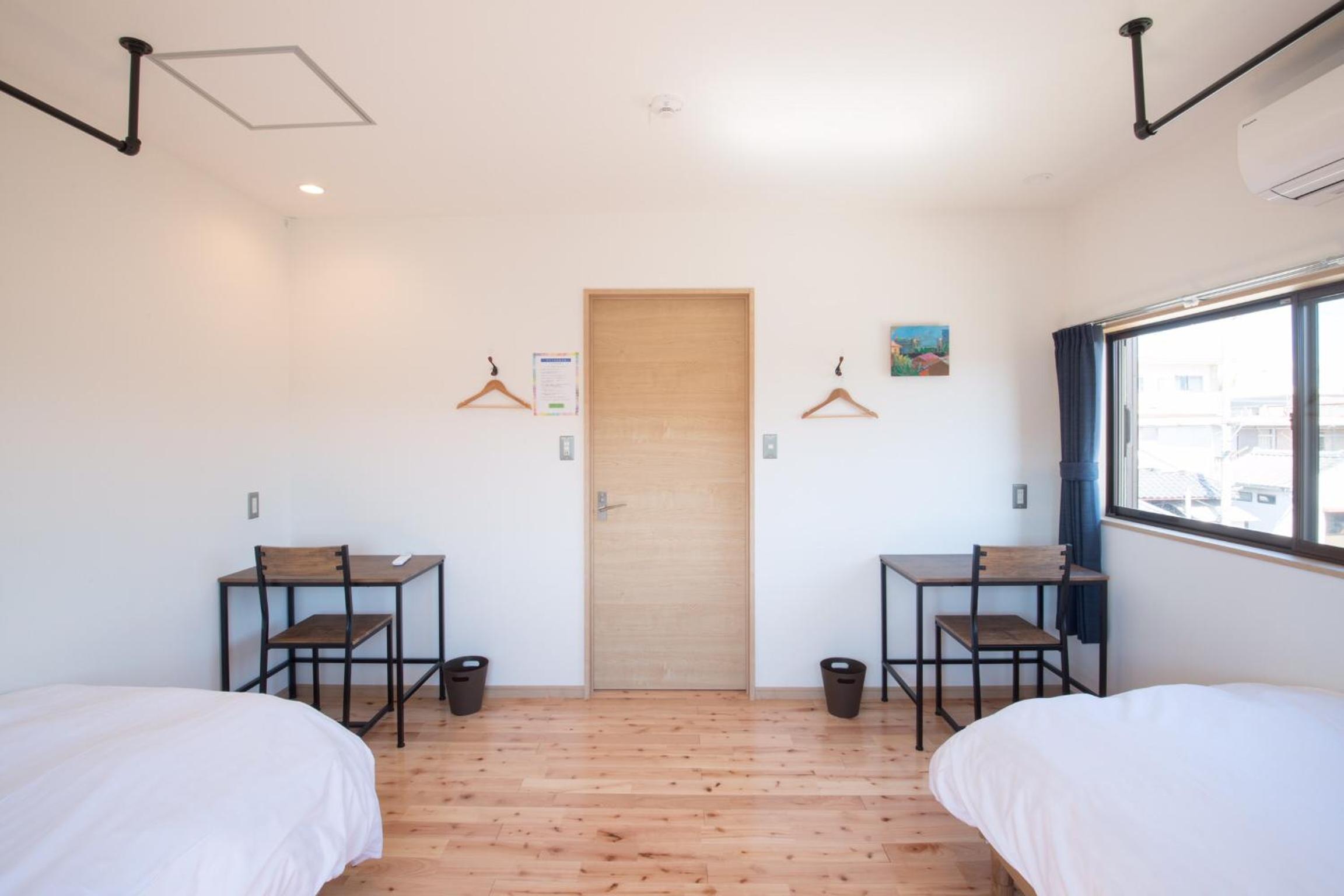 Twin Room - Photo 1