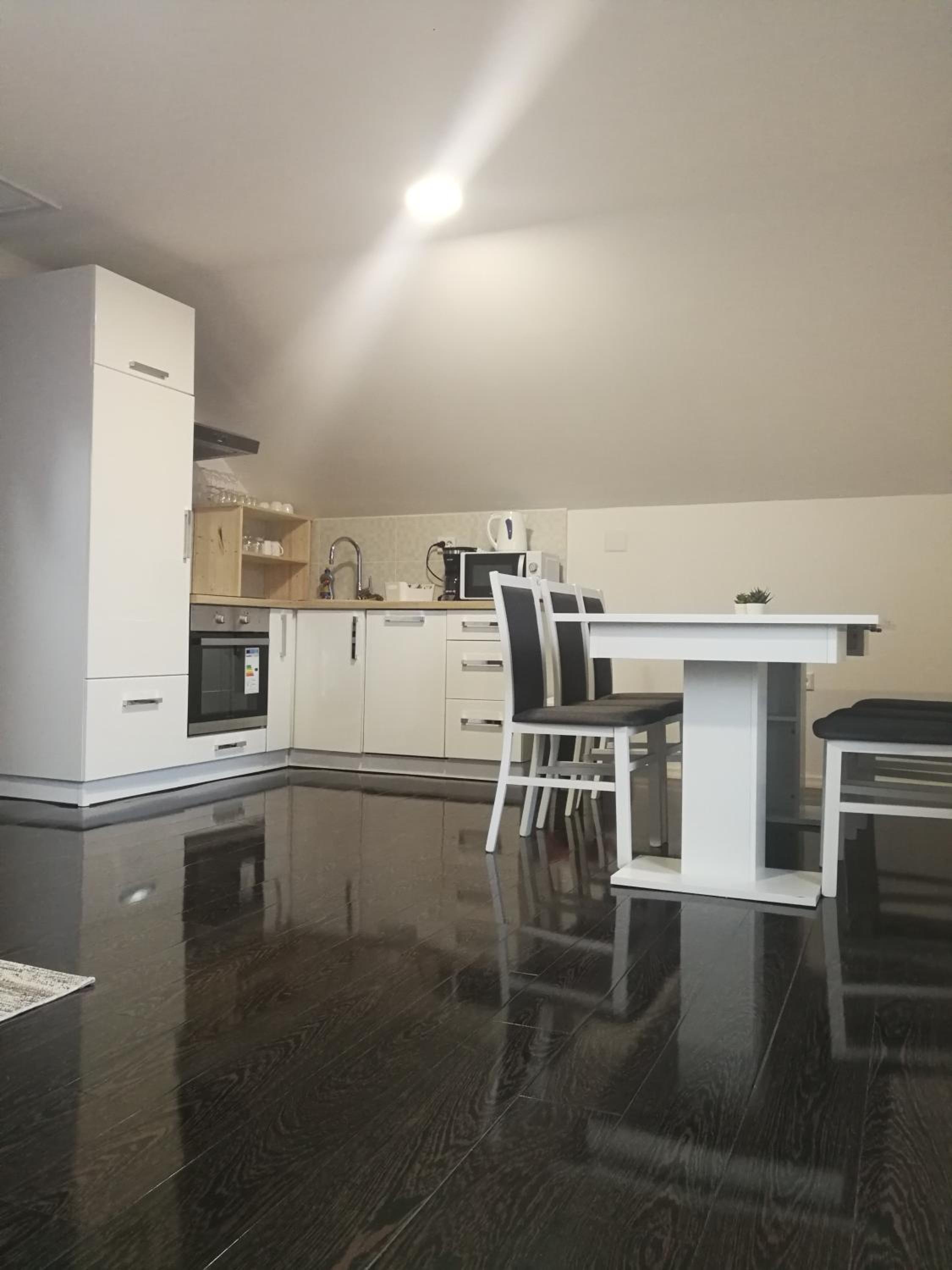 Three-Bedroom Apartment - Photo 12