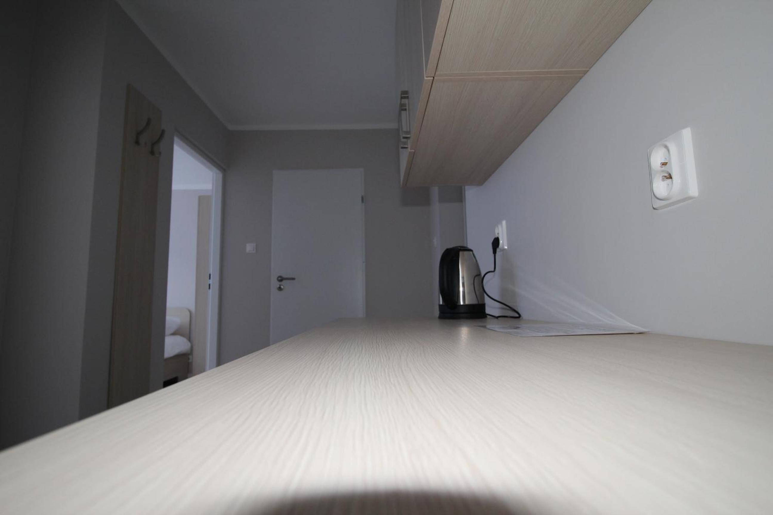 Deluxe Quadruple Room - Photo 8