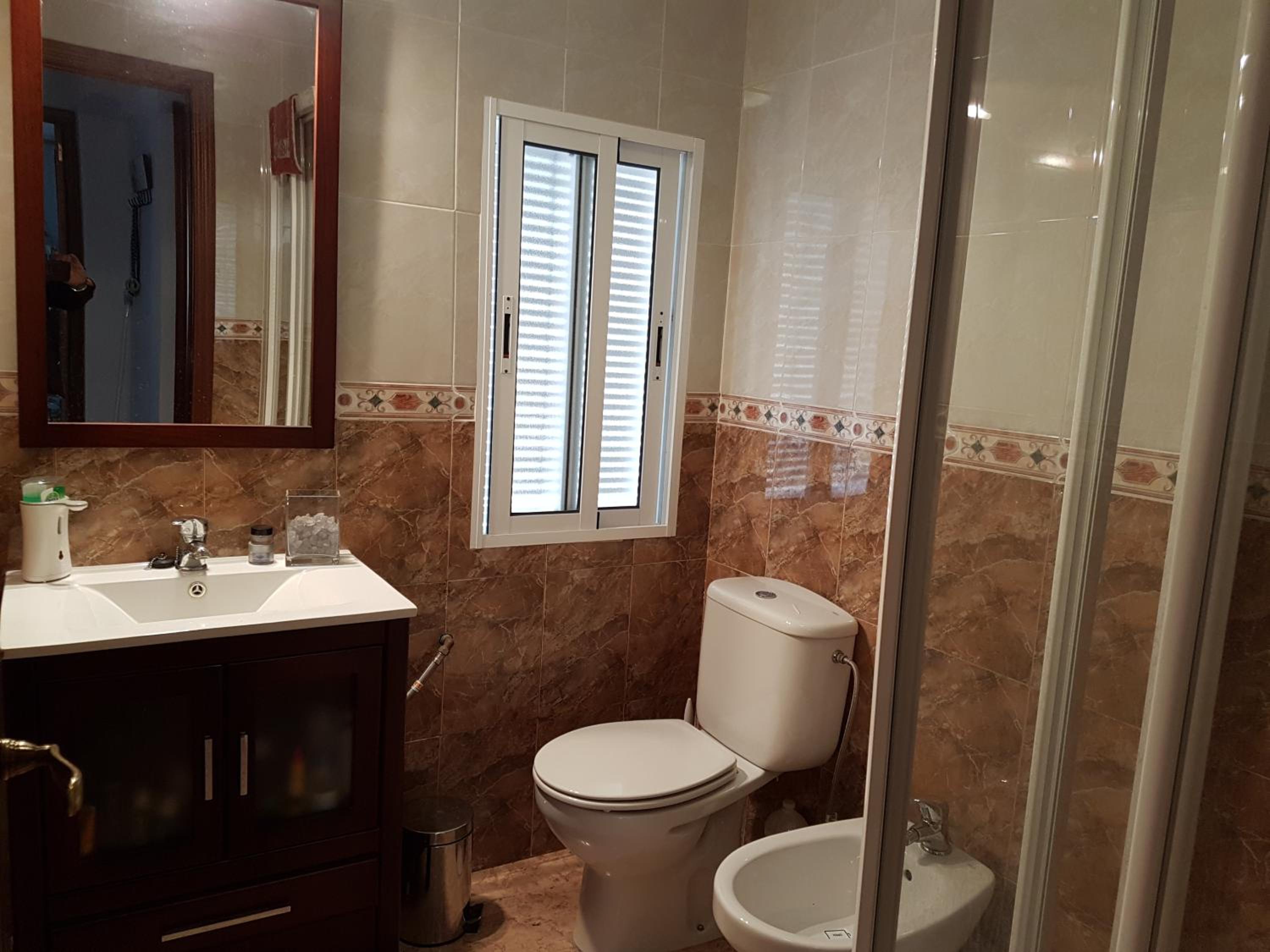 Three-Bedroom Apartment - Photo 7