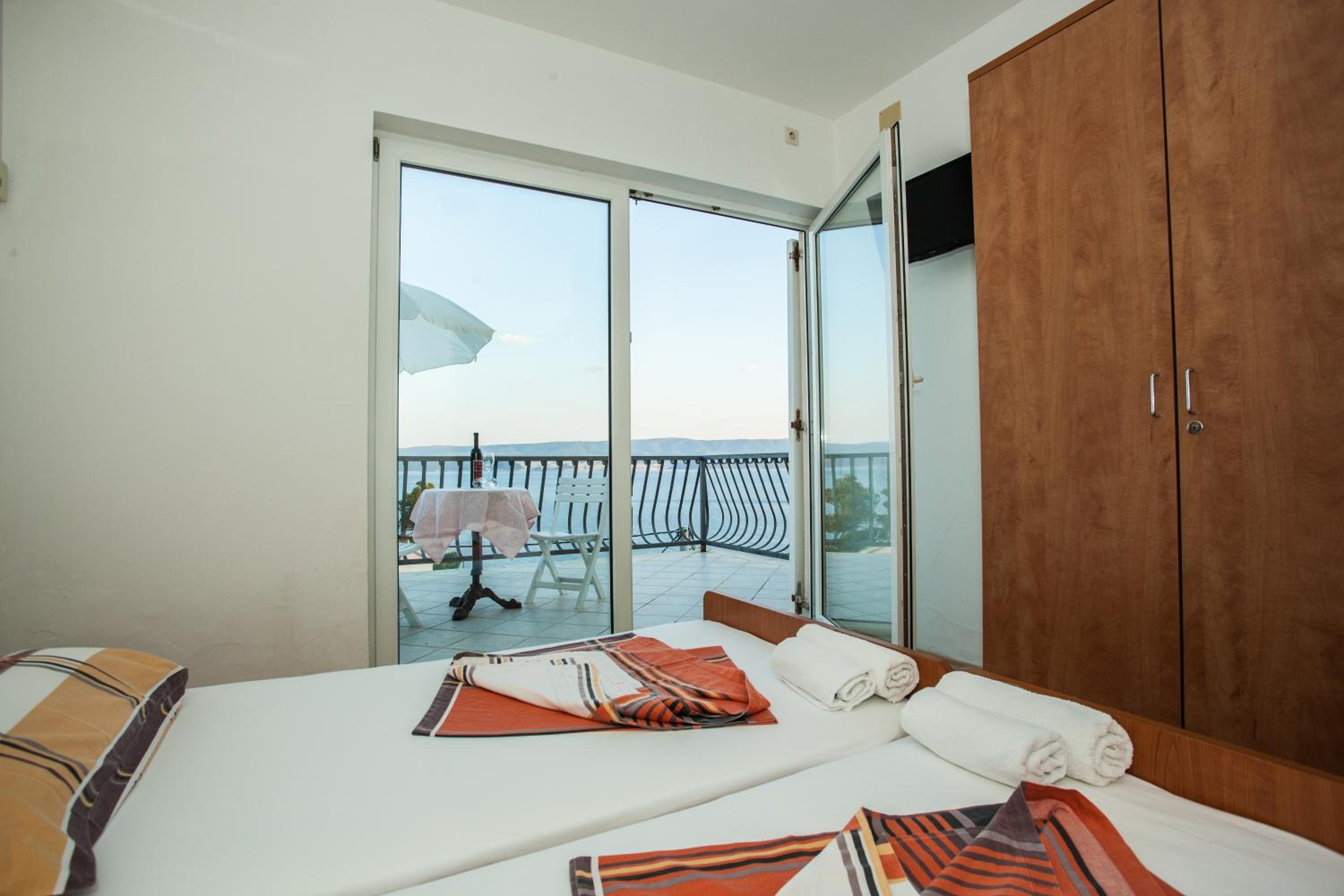 One-Bedroom Apartment with Balcony and Sea View