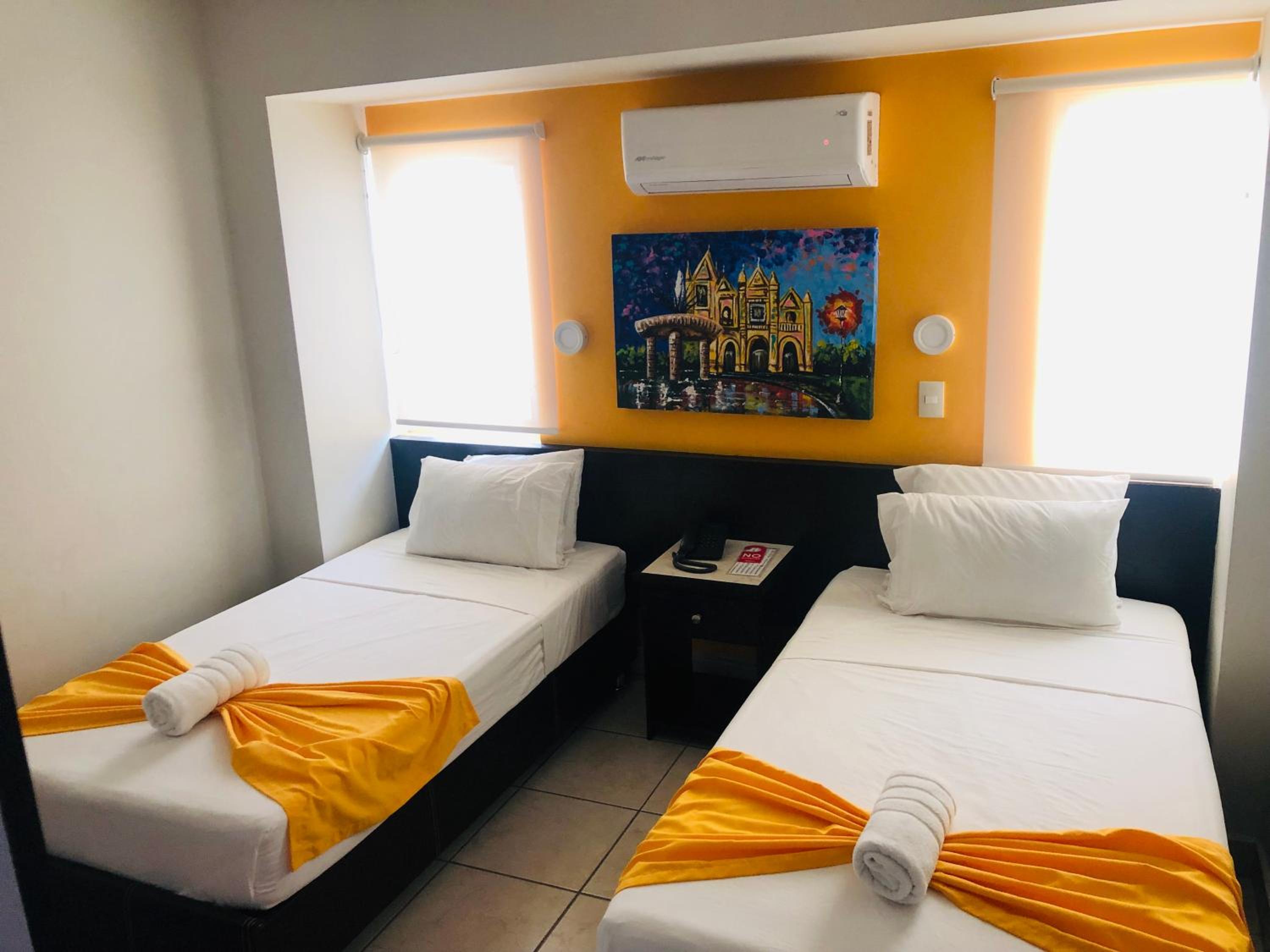 Standard Twin Room - Photo 1