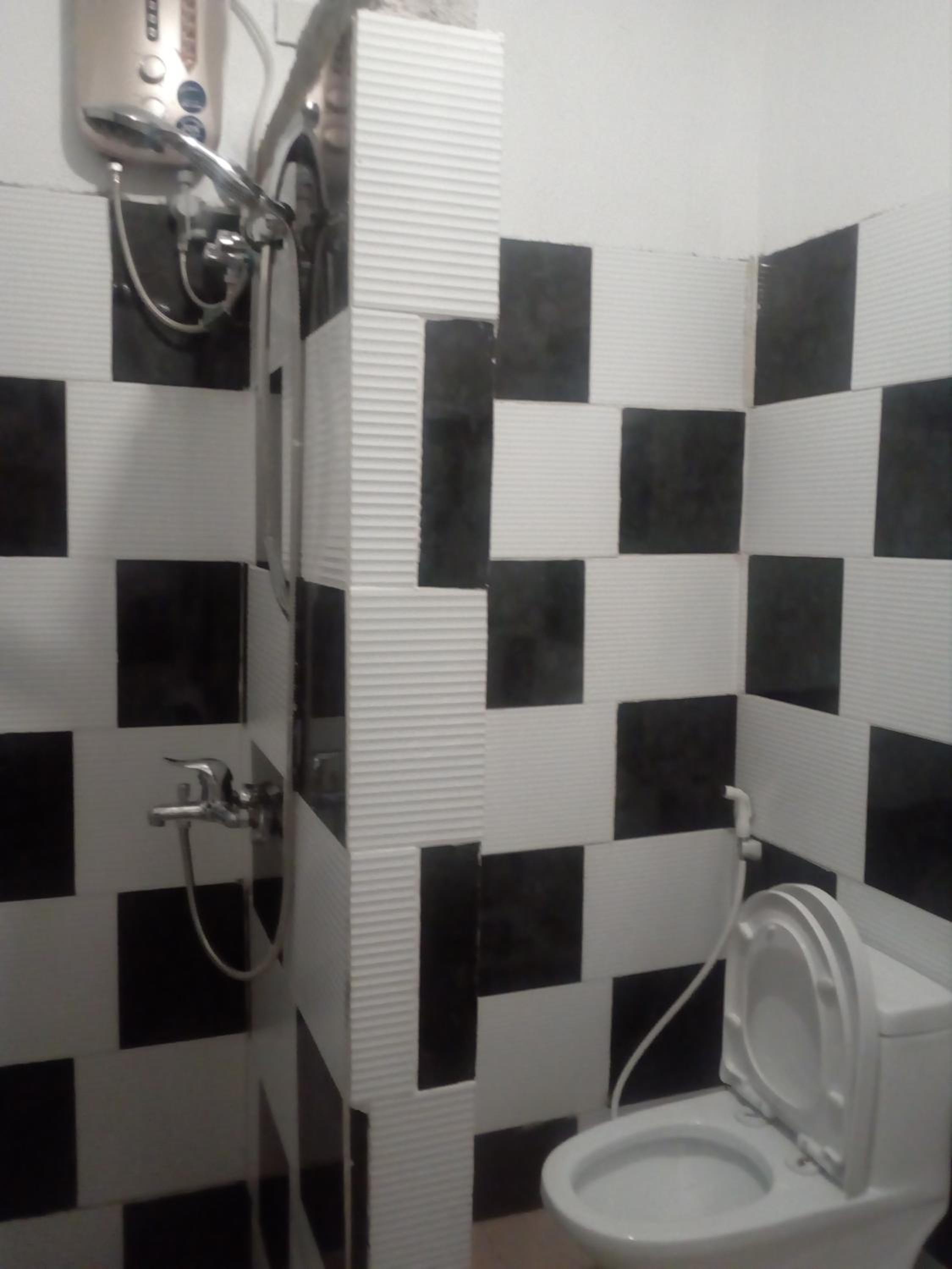 Deluxe Family Suite - Photo 13