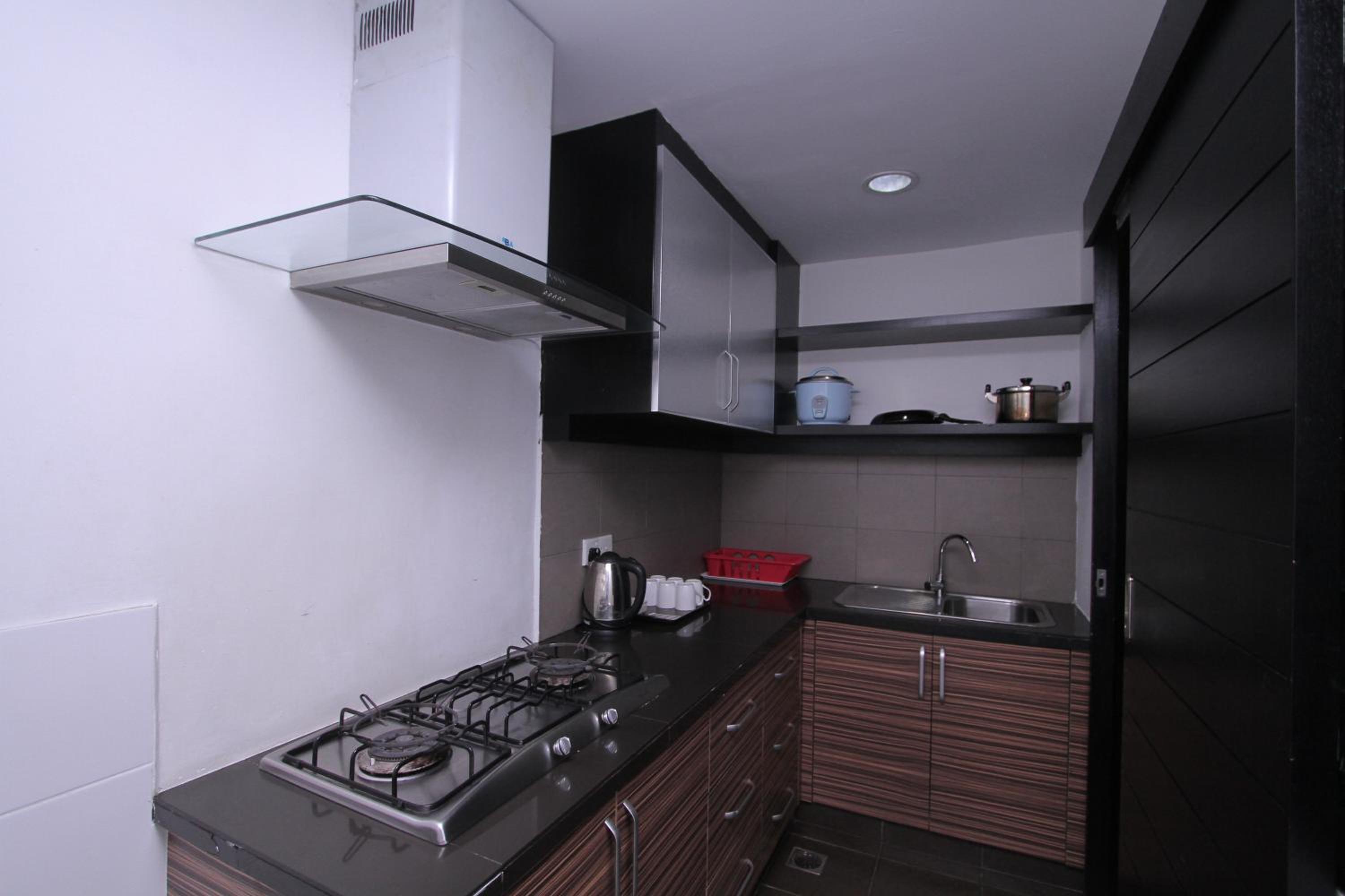 Three-Bedroom Apartment - Photo 27