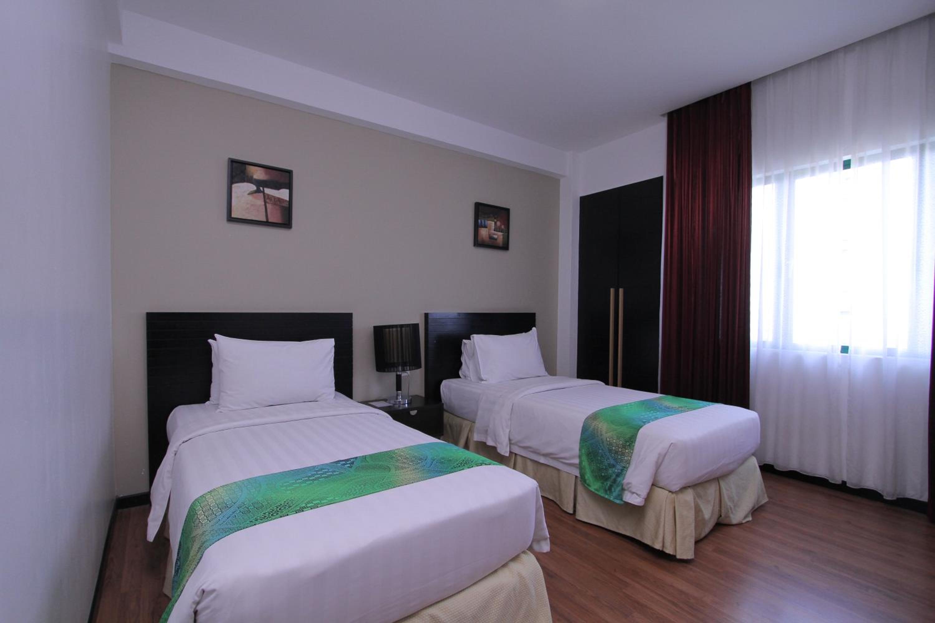 Three-Bedroom Apartment - Photo 29