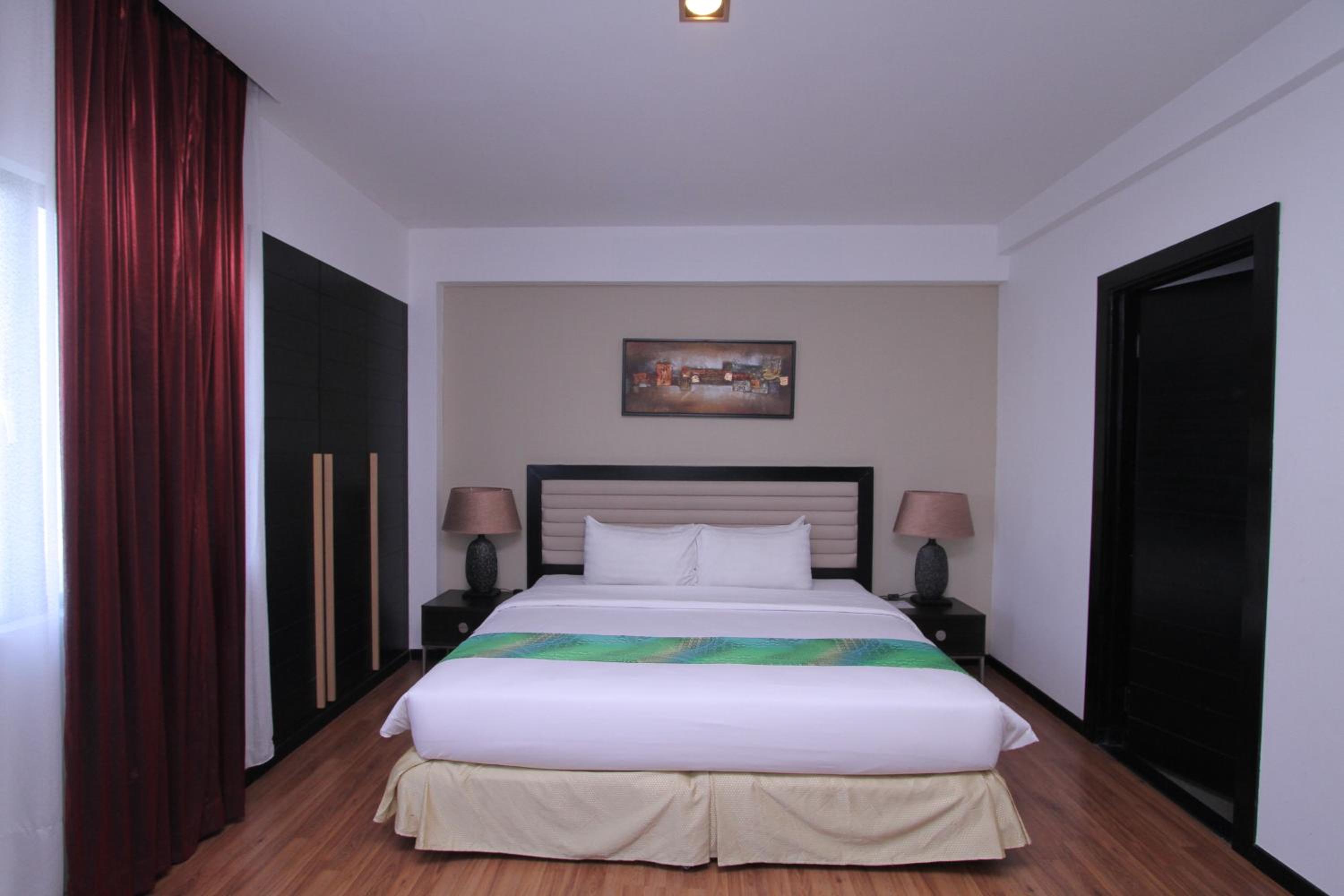 Three-Bedroom Apartment - Photo 22