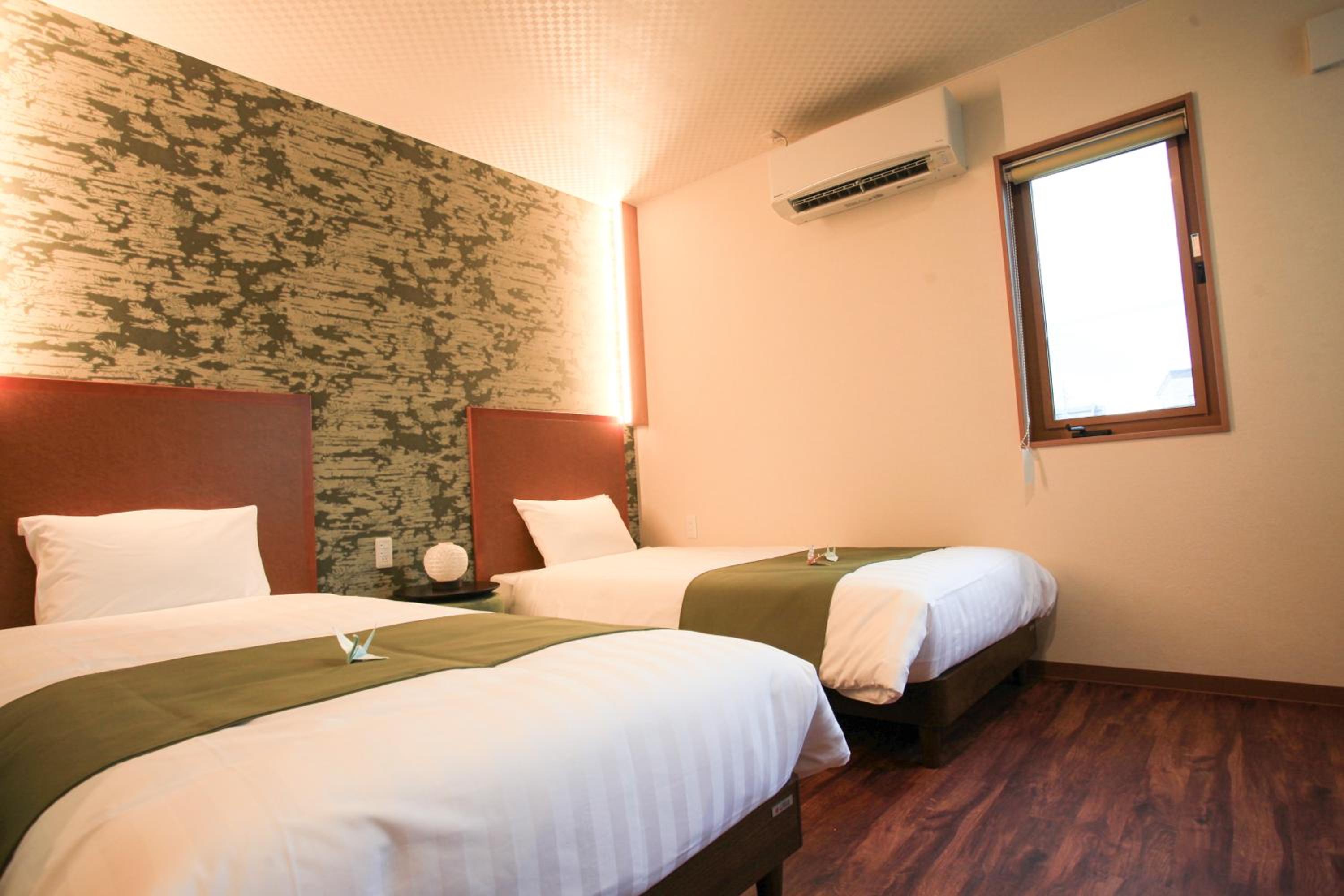 Twin Room - Photo 2