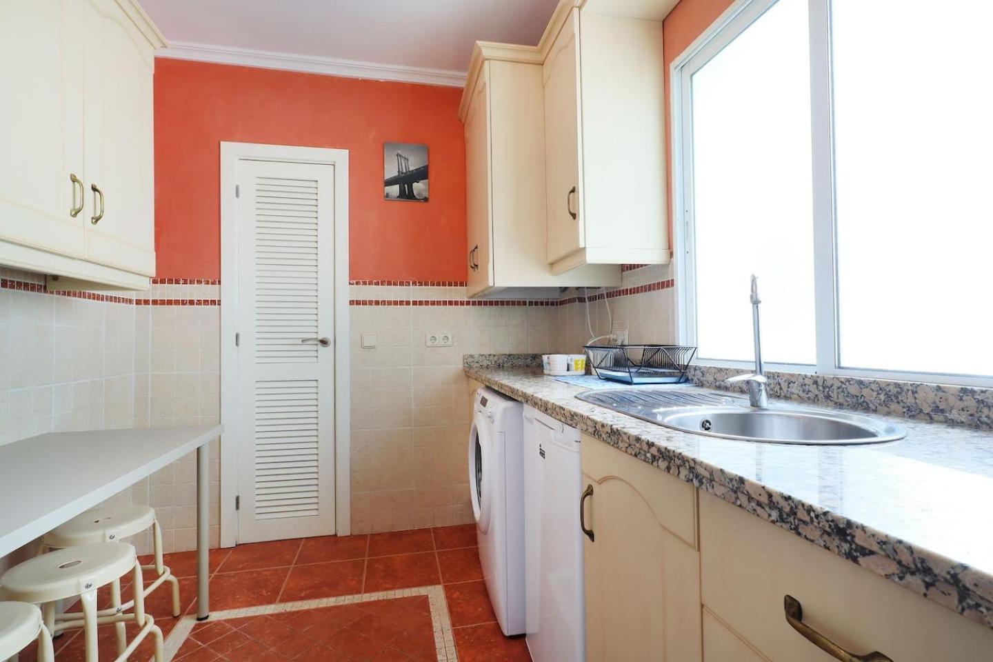 Three-Bedroom Apartment - Photo 23
