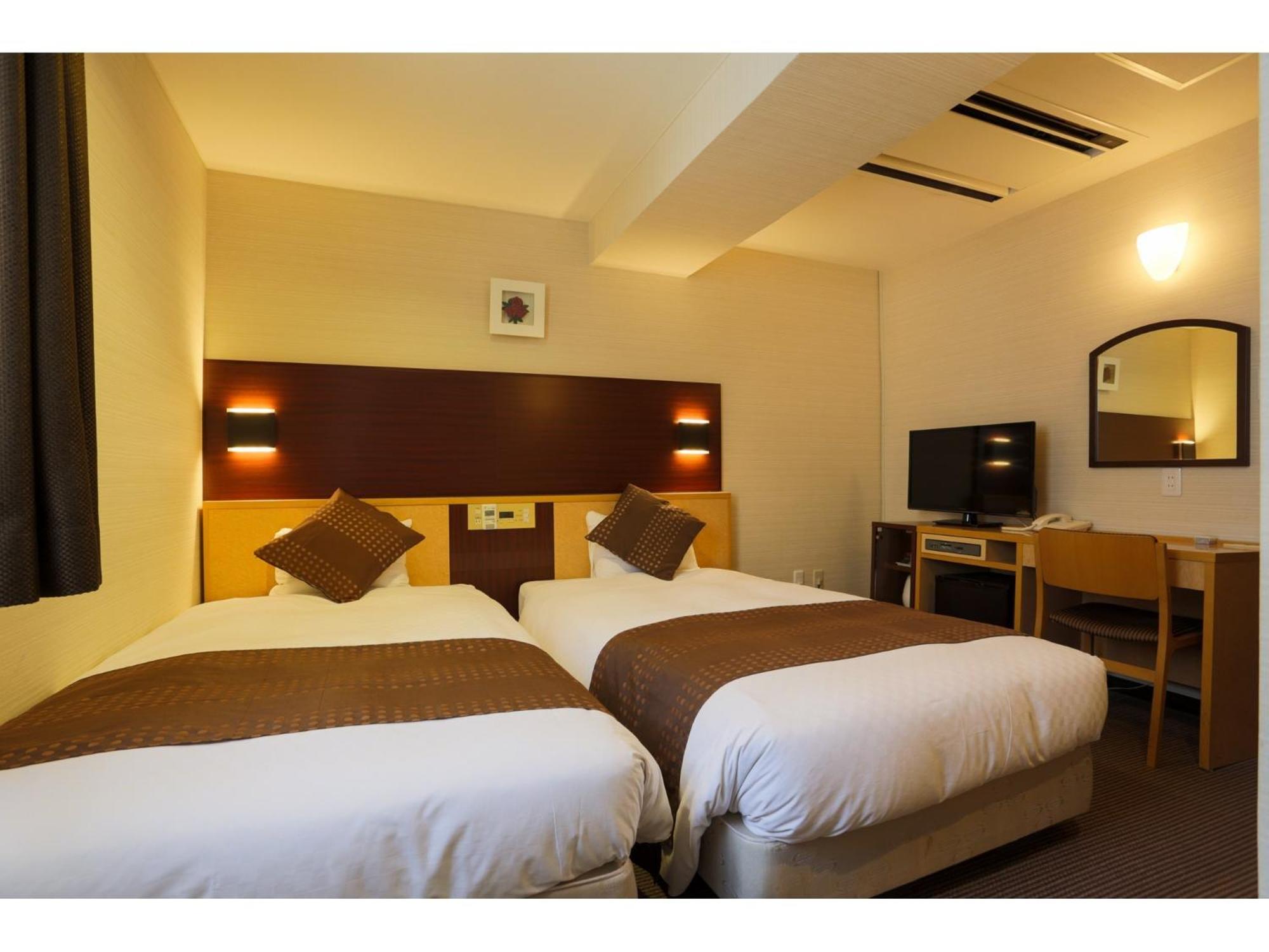 Twin Room - Non-Smoking photo 1