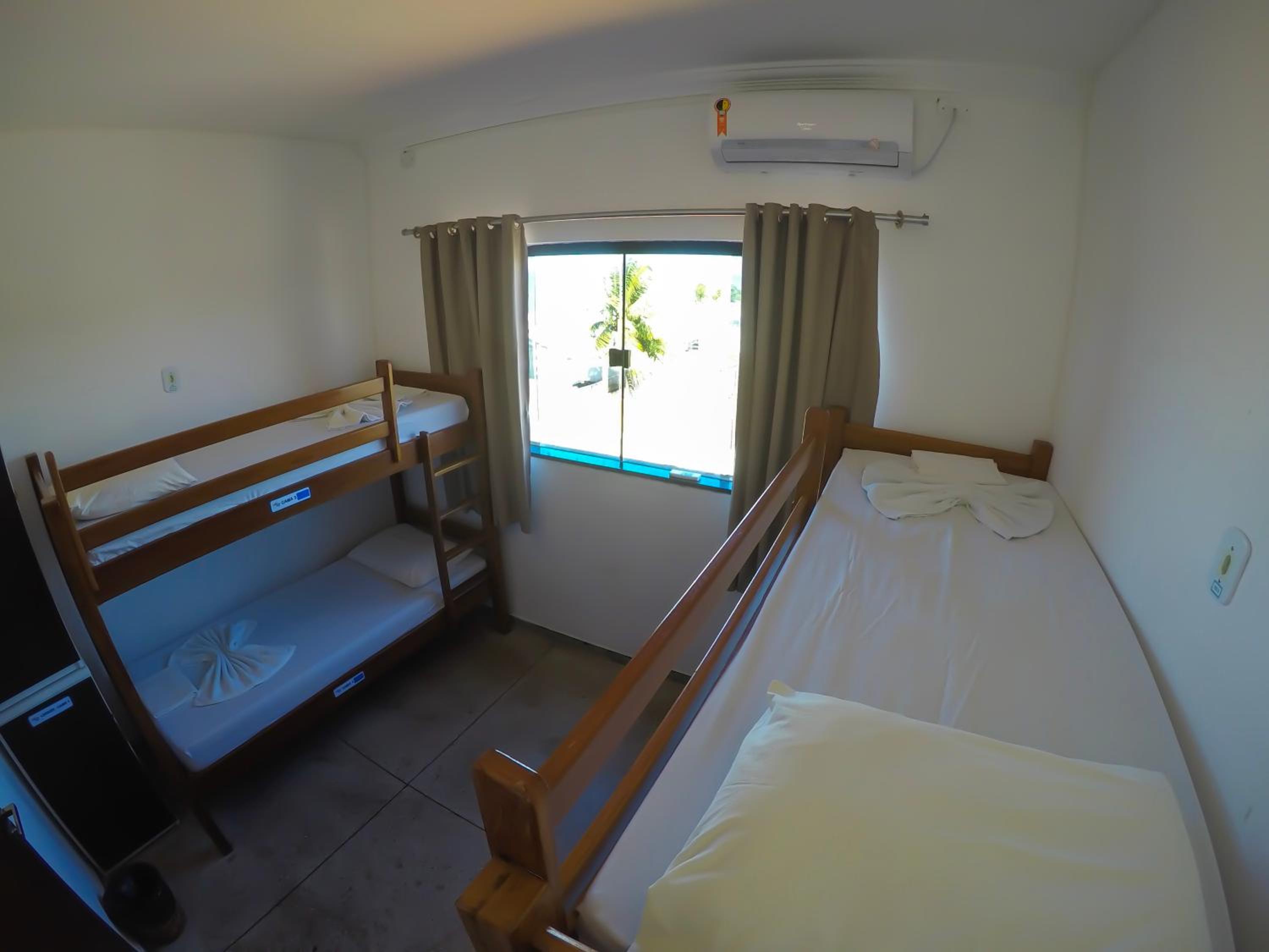 Bed in 4-Bed Mixed Dormitory Room with Air Conditioning photo 1