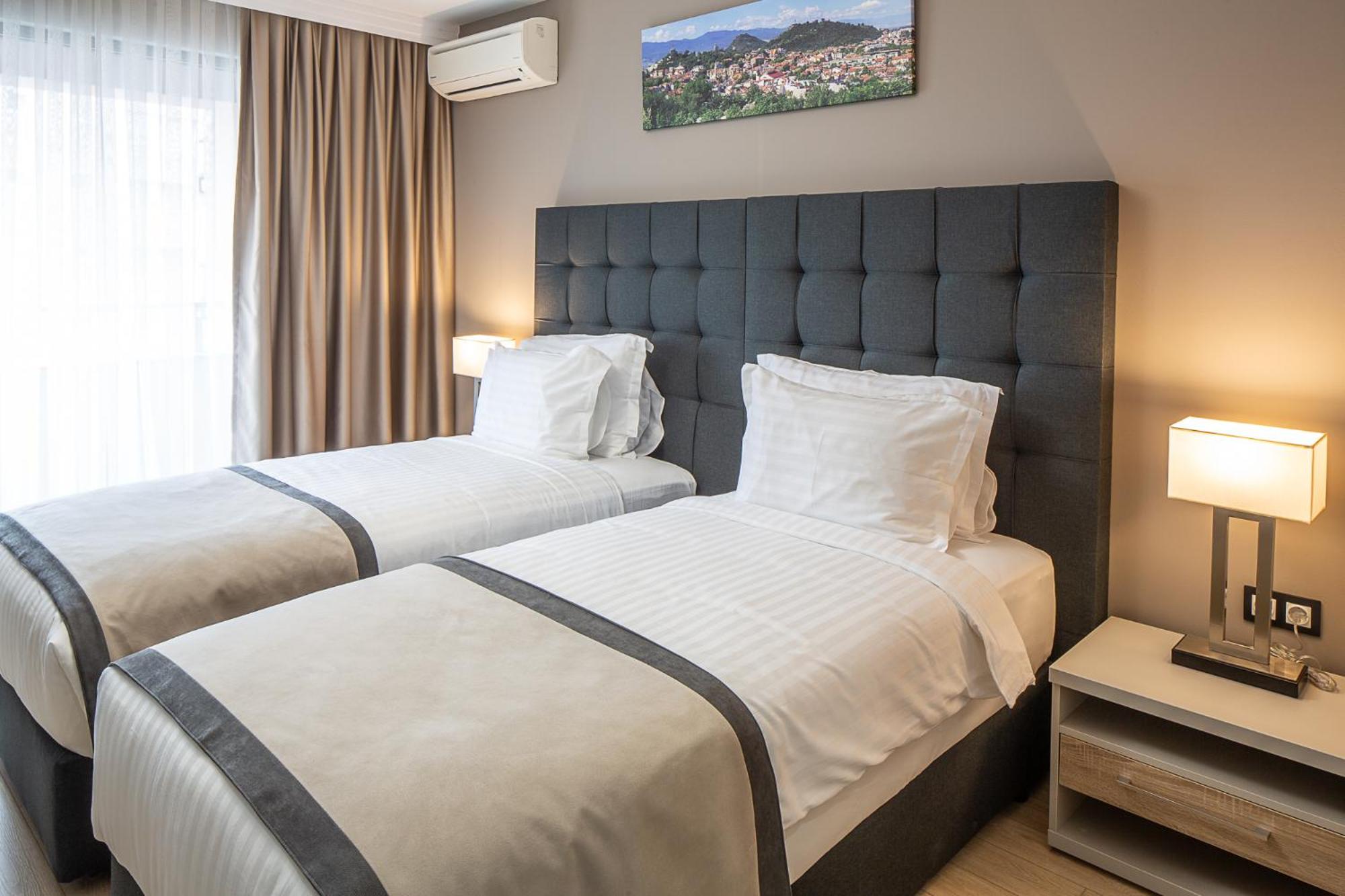 Deluxe Two-Bedroom Apartment with Balcony - Photo 3