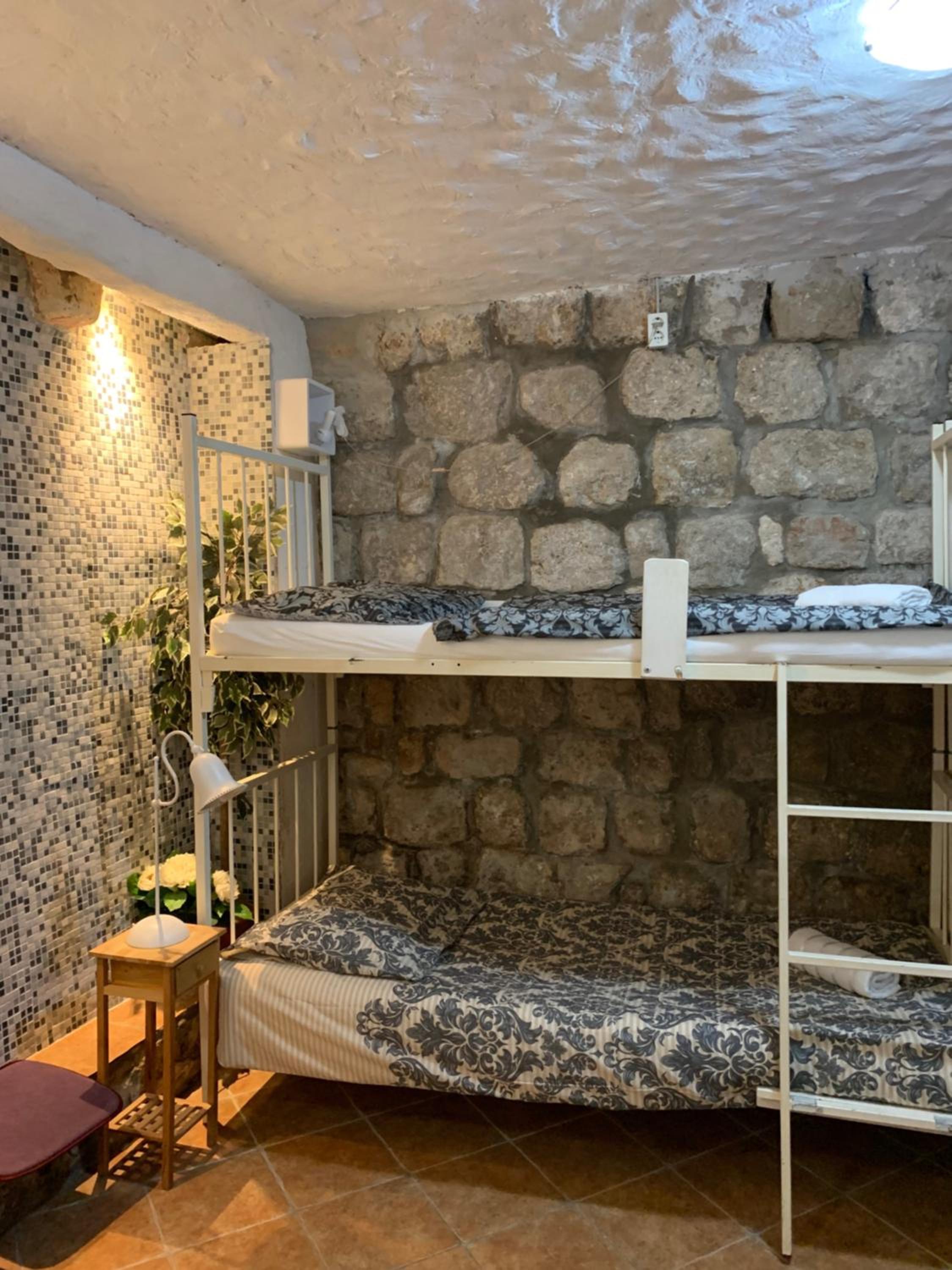 Single Bed in Dormitory Room