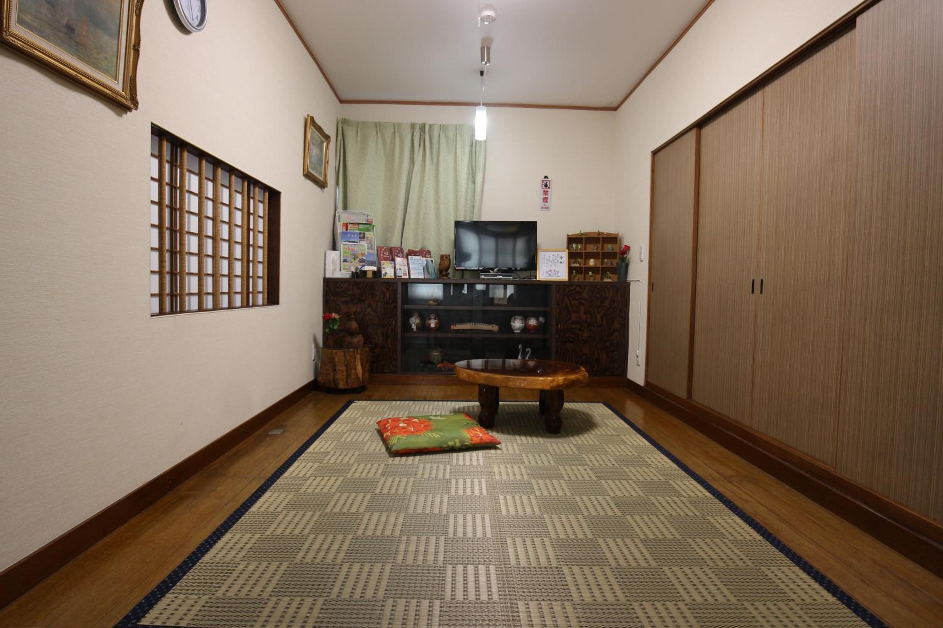 Three-Bedroom House - Photo 31