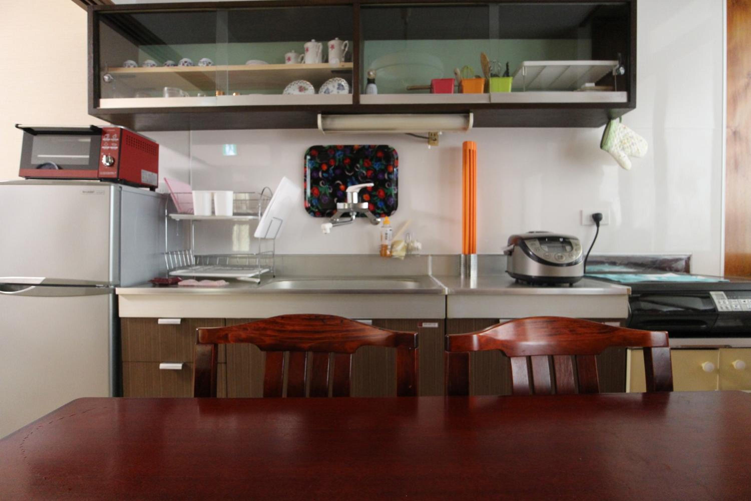 Three-Bedroom House - Photo 30
