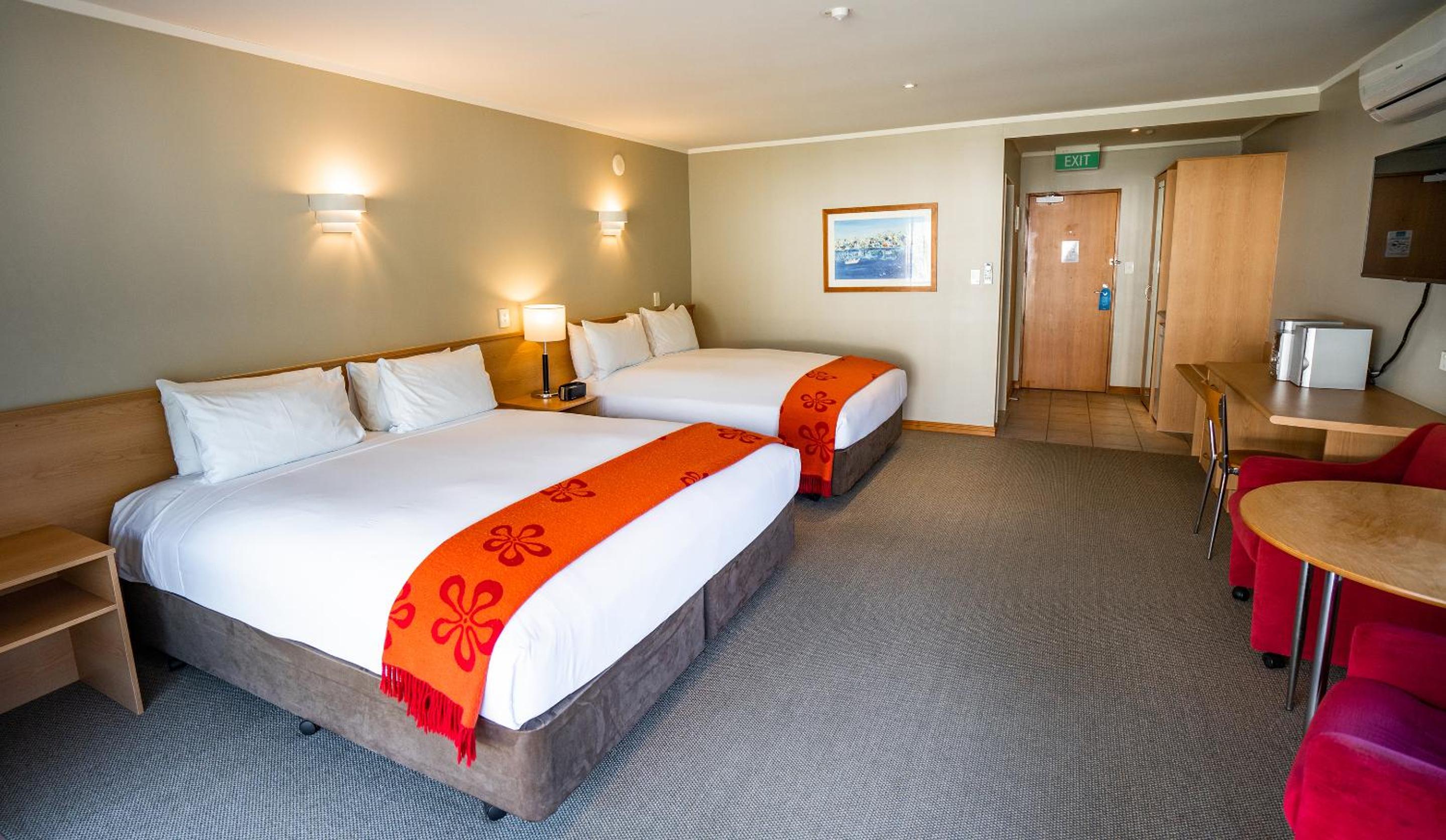 Superior Twin Room with a King & Queen Bed - Photo 1