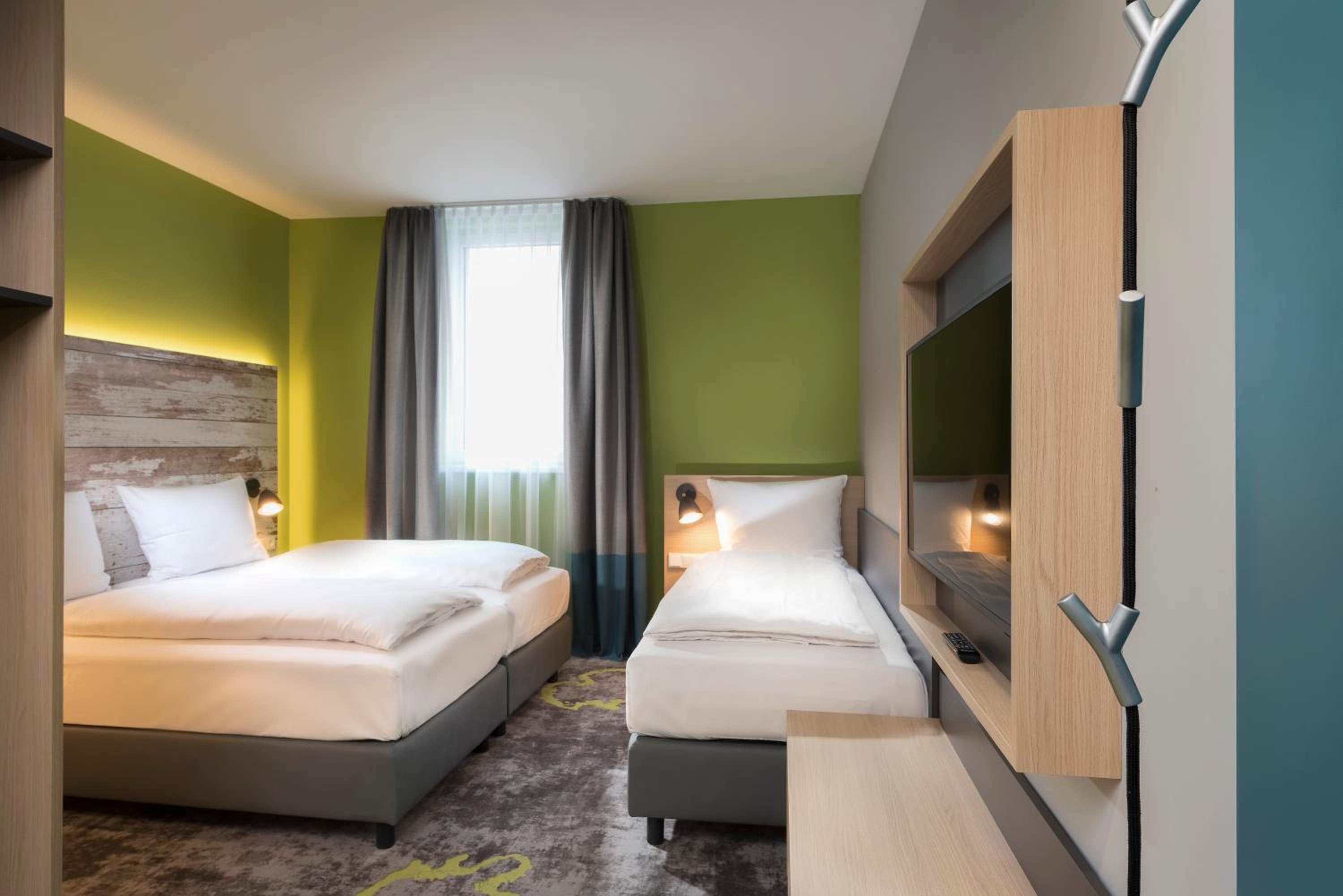 family room with one double and one single bed photo 1