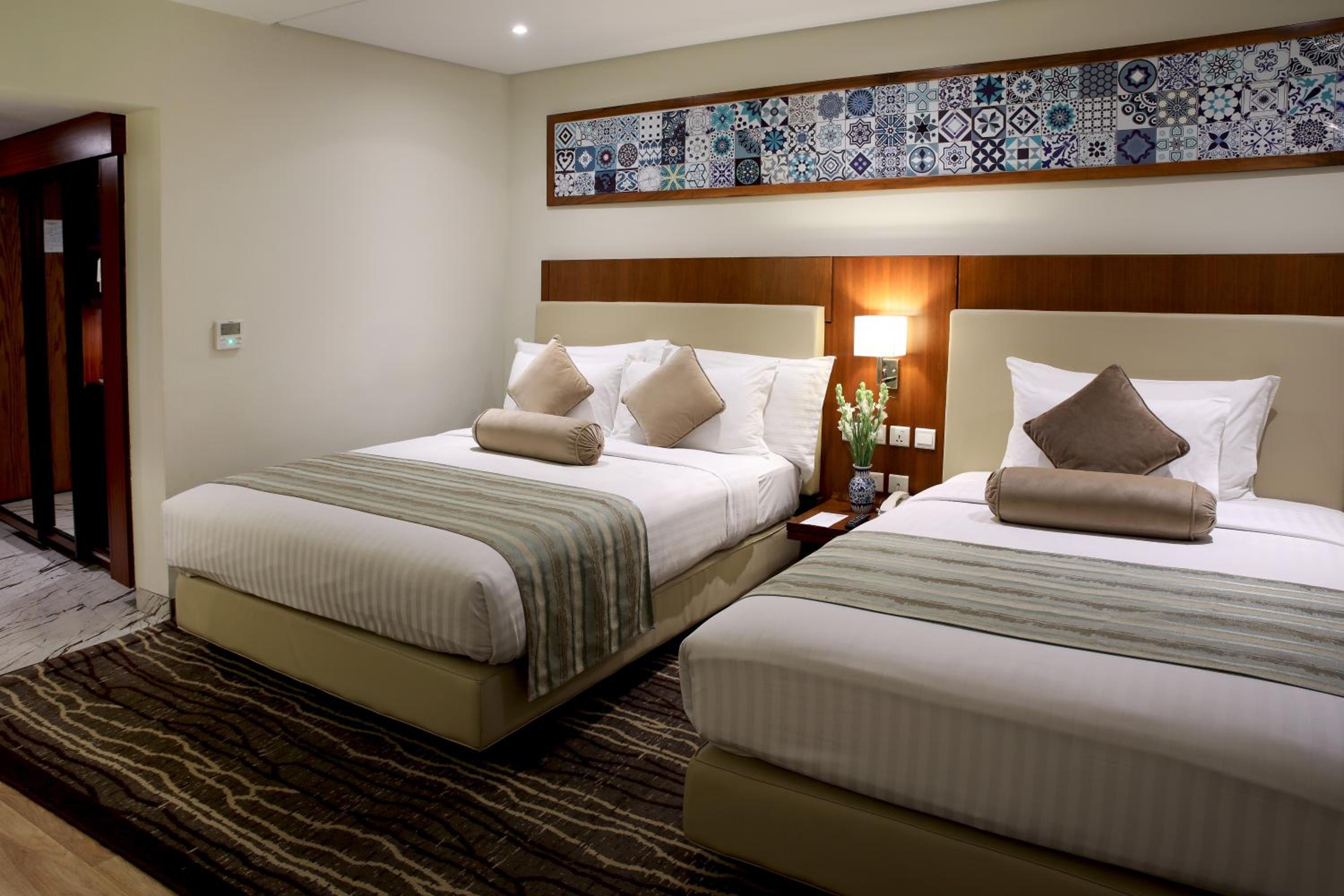 Deluxe Queen Room with Two Queen Beds photo 2