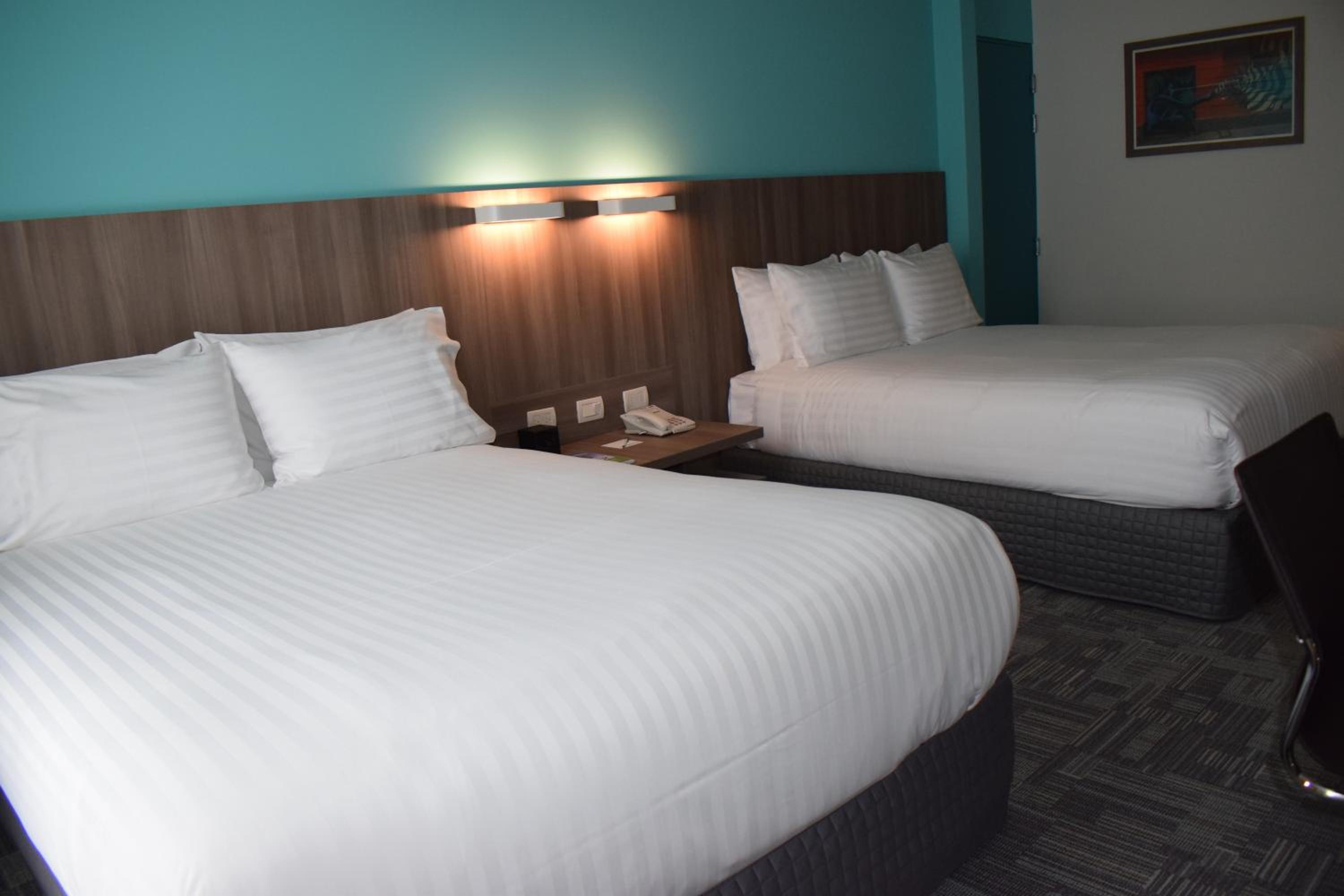 Standard Queen Room with Two Queen Beds - Top Floor photo 2