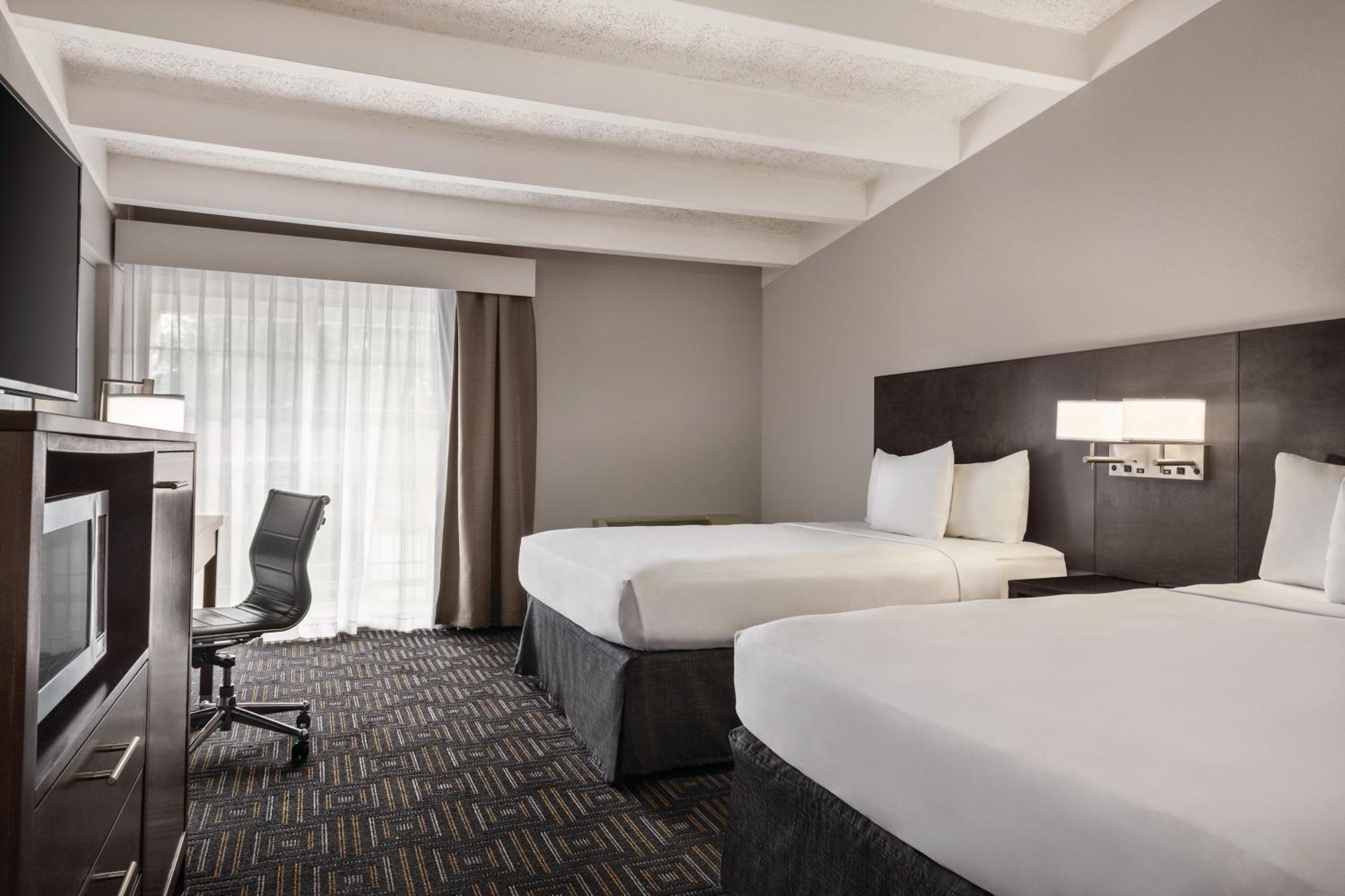 Premium Queen Room with Two Queen Beds - Non-Smoking photo 1