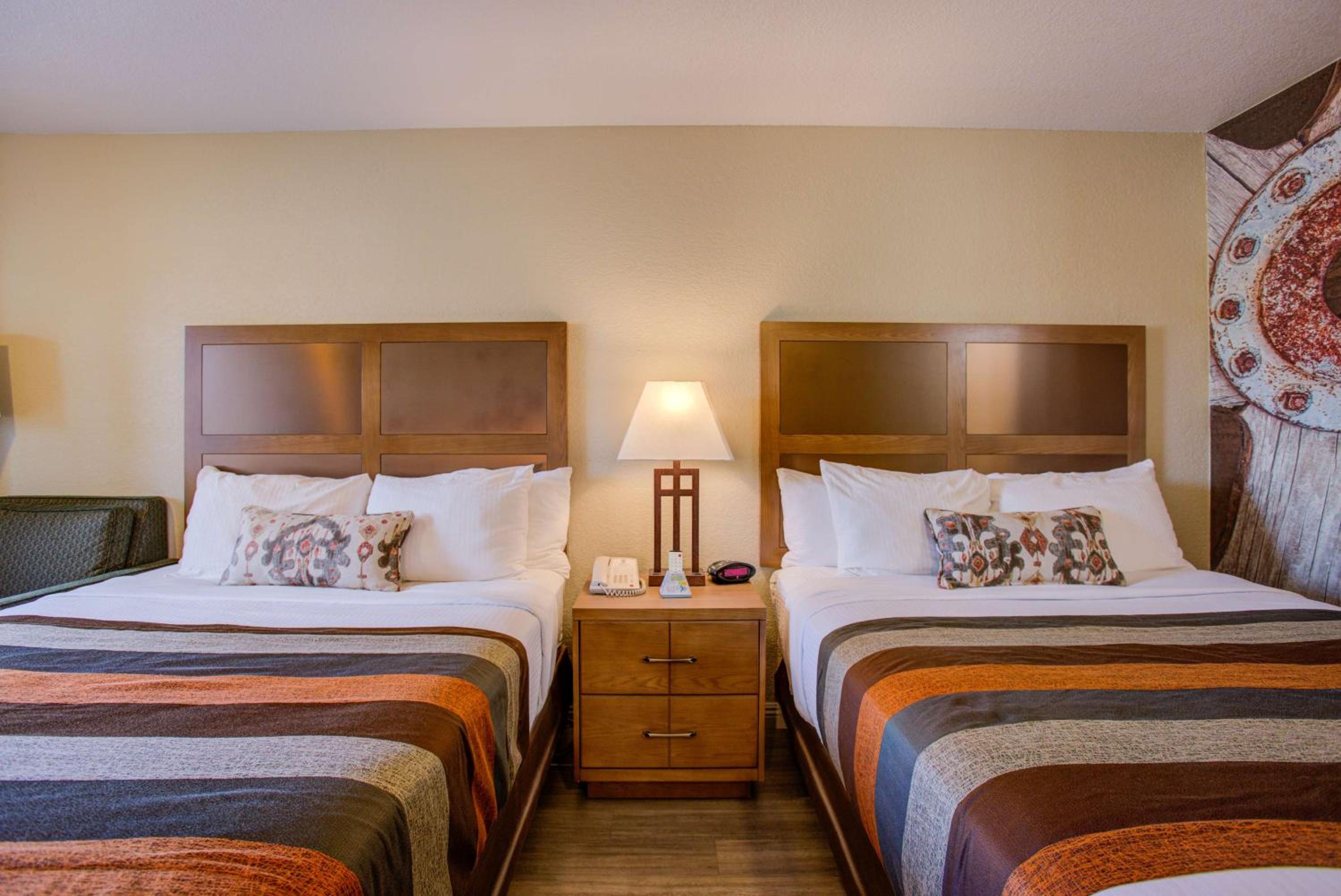 Queen Room with Two Queen Beds and Sofa Bed - Non-Smoking photo 1