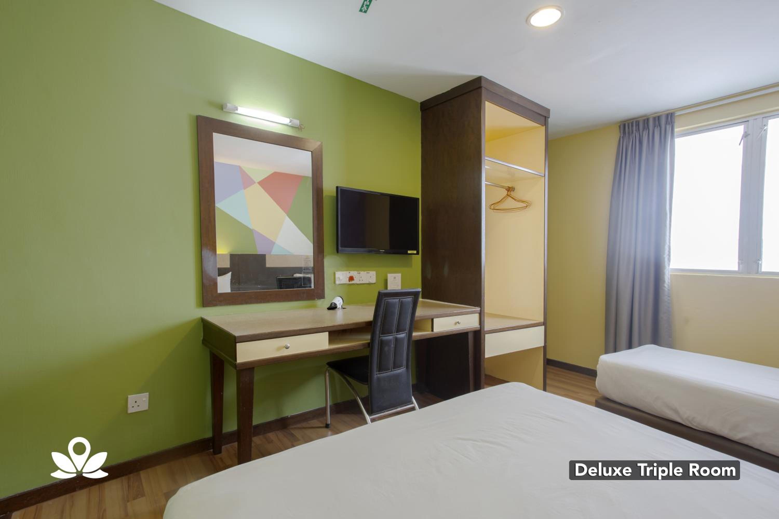 Deluxe Triple Room