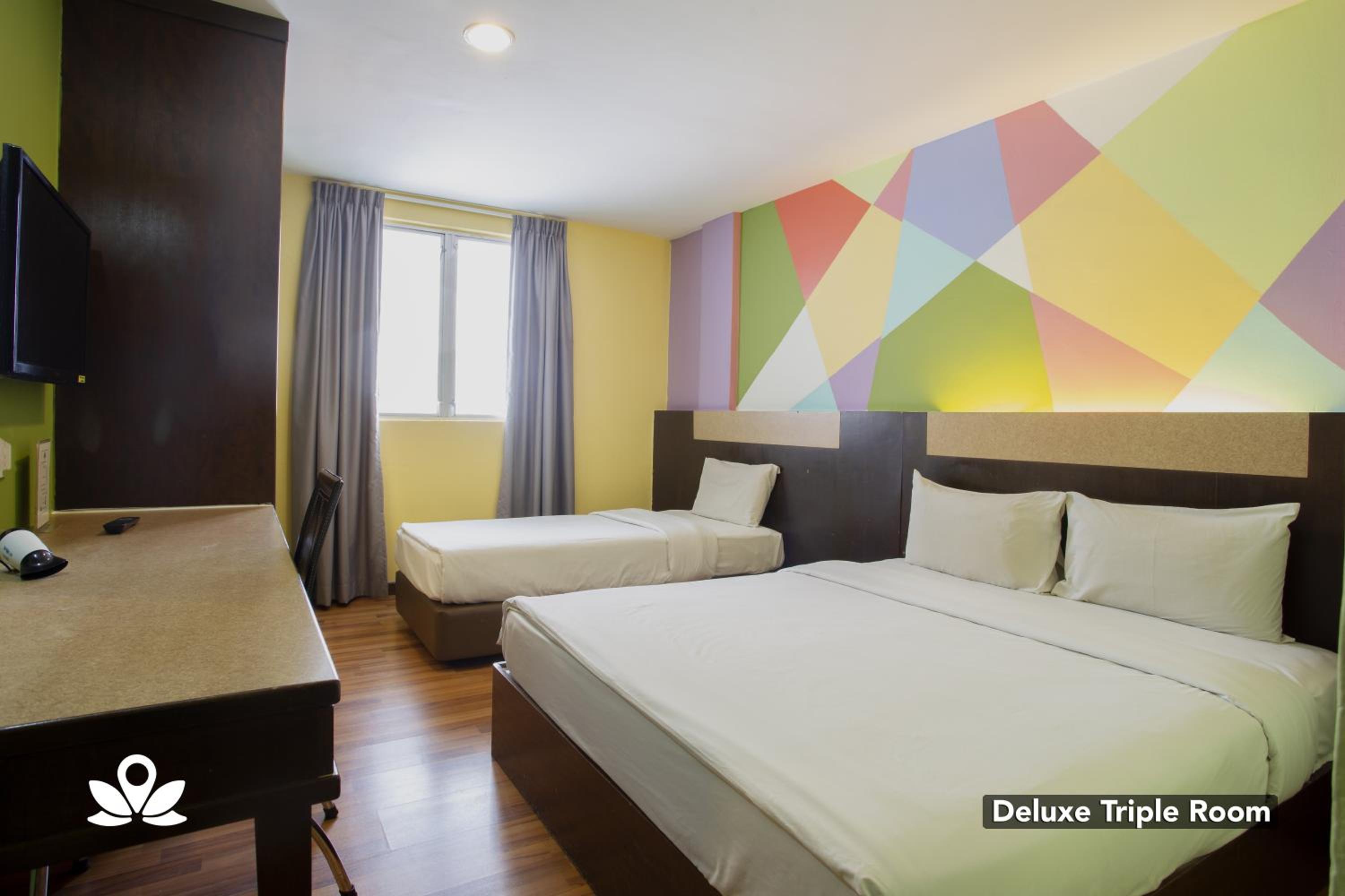 Deluxe Triple Room