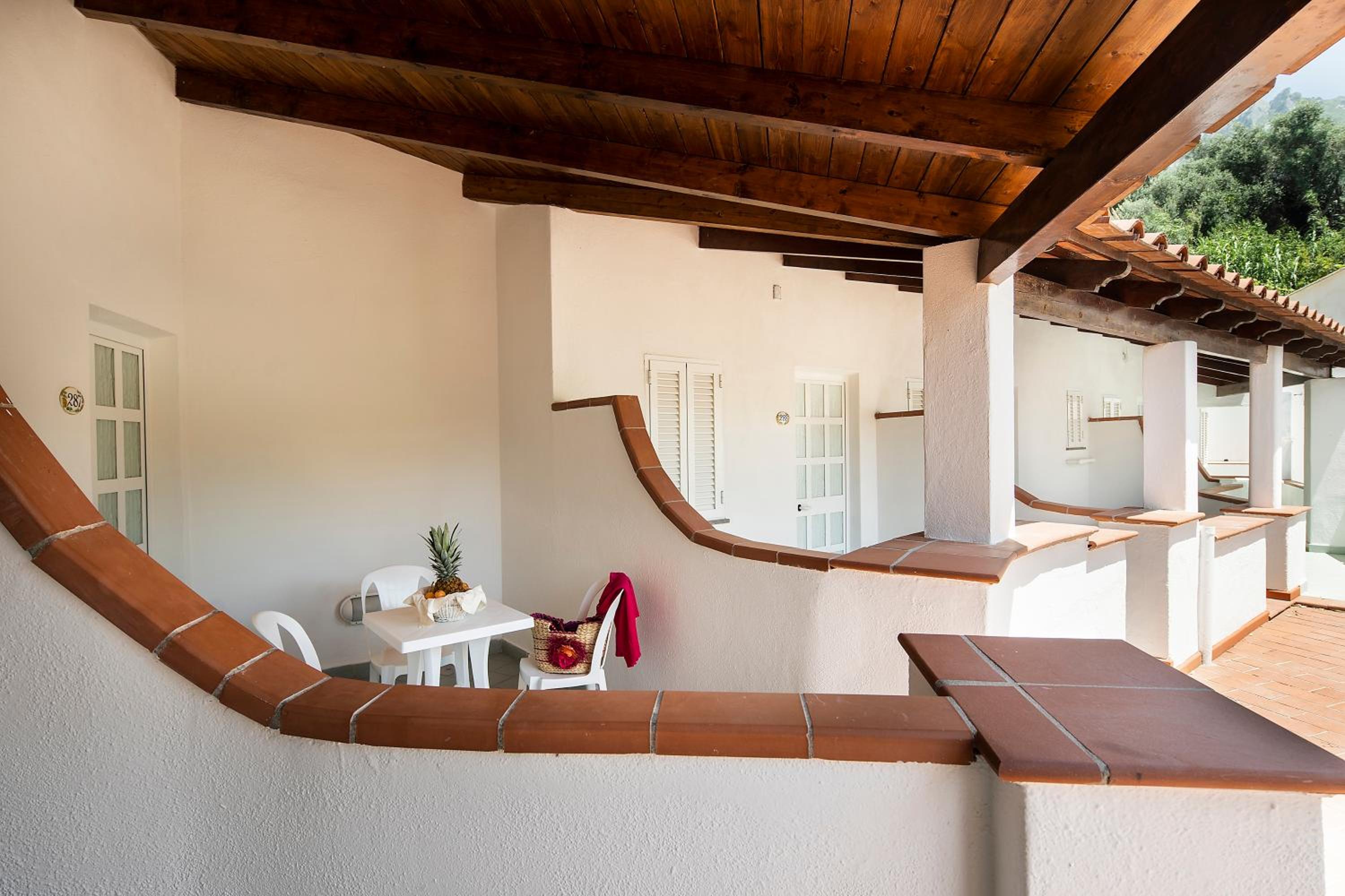 Quarto Individual com Varanda
