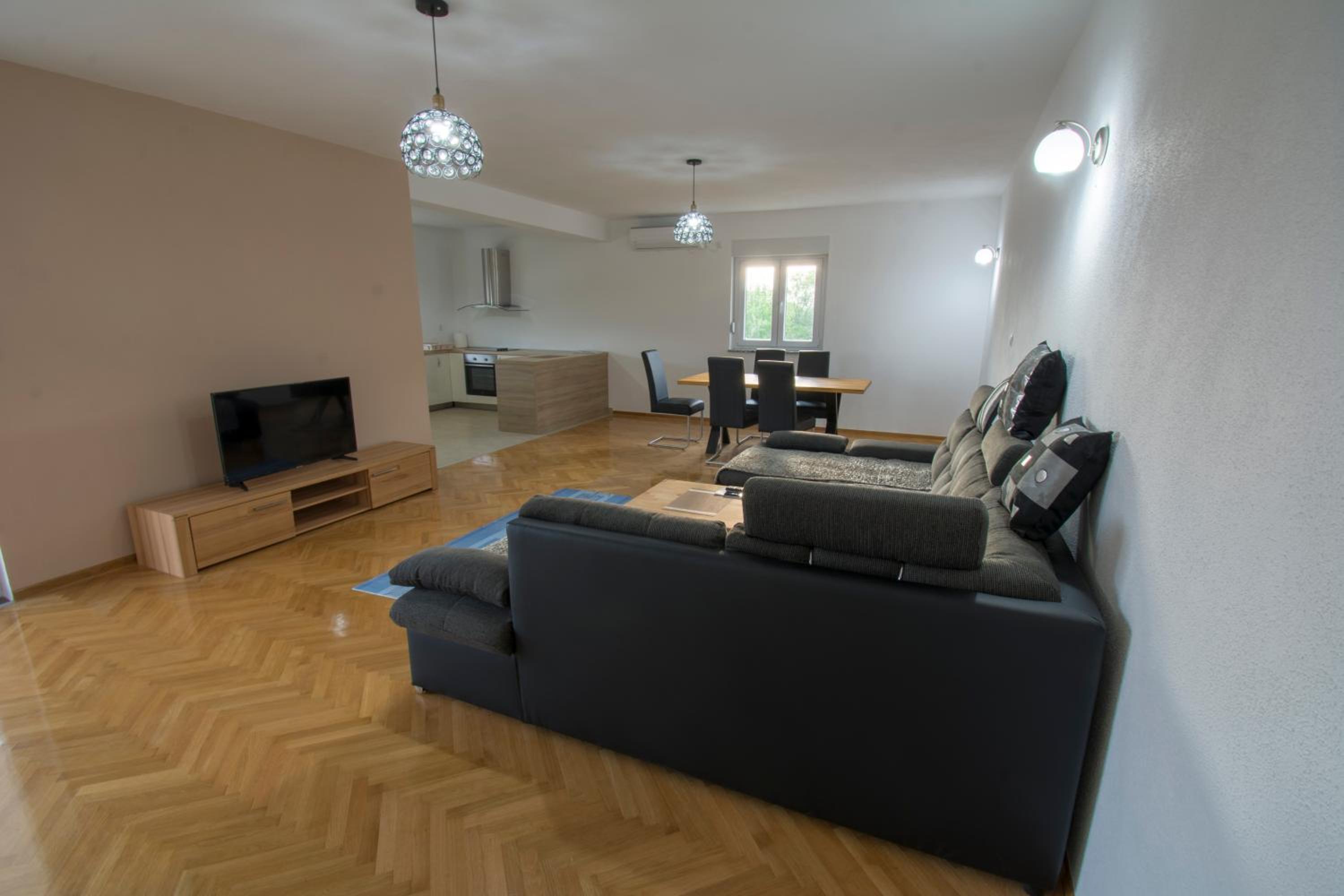 Three-Bedroom Apartment photo 1