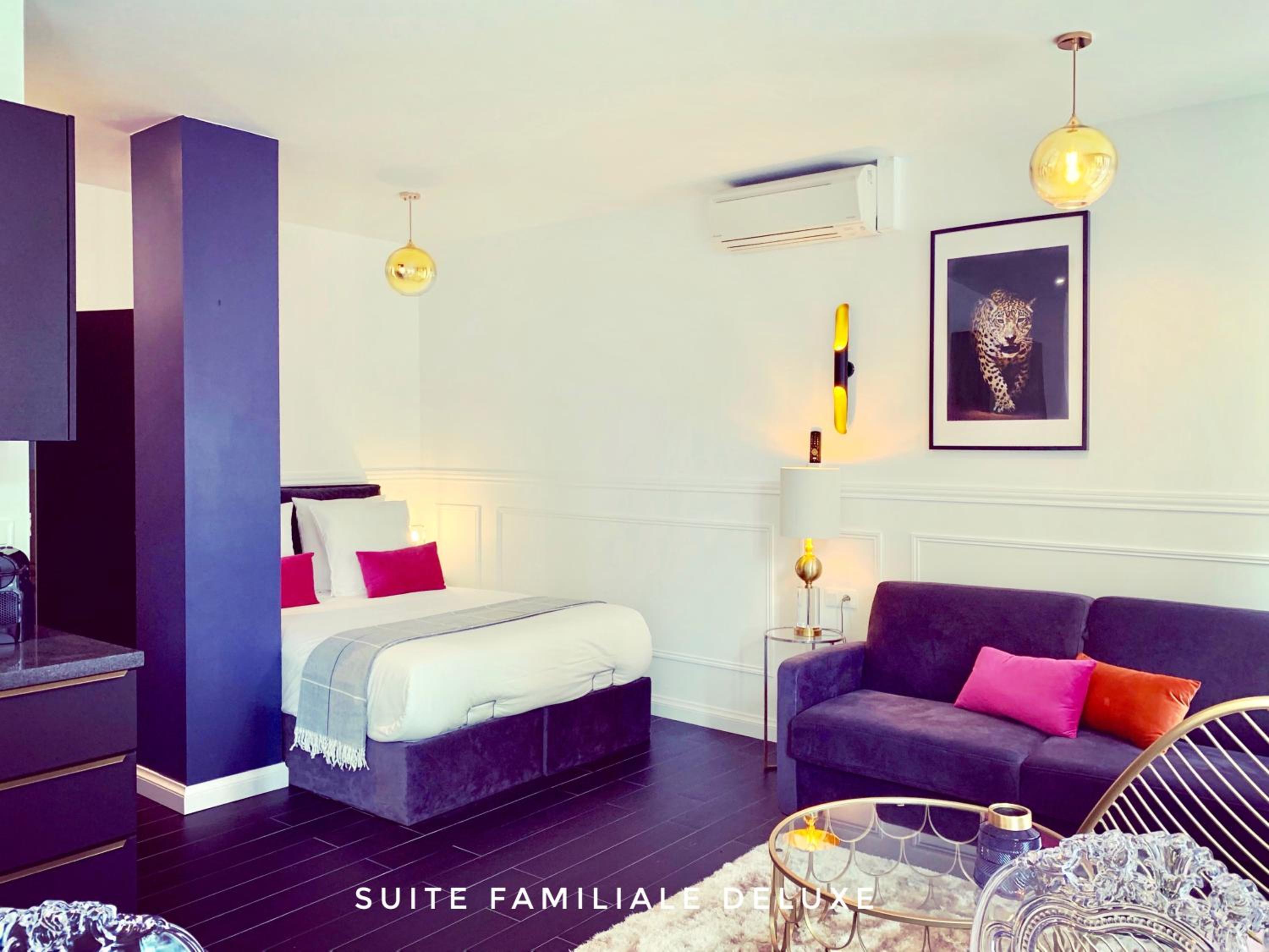 Deluxe Family Suite - Photo 19