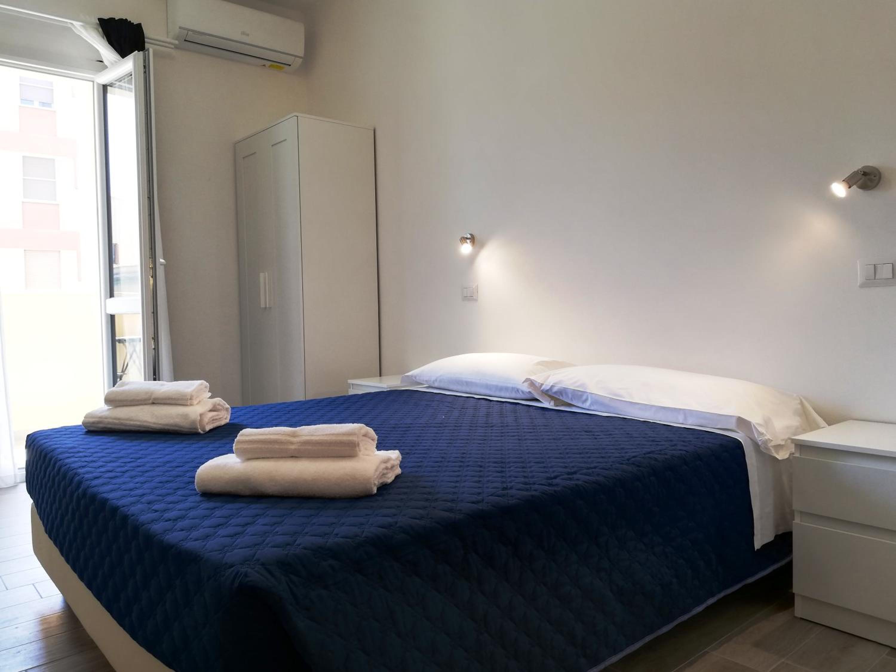 Quadruple Room with Balcony - Photo 1