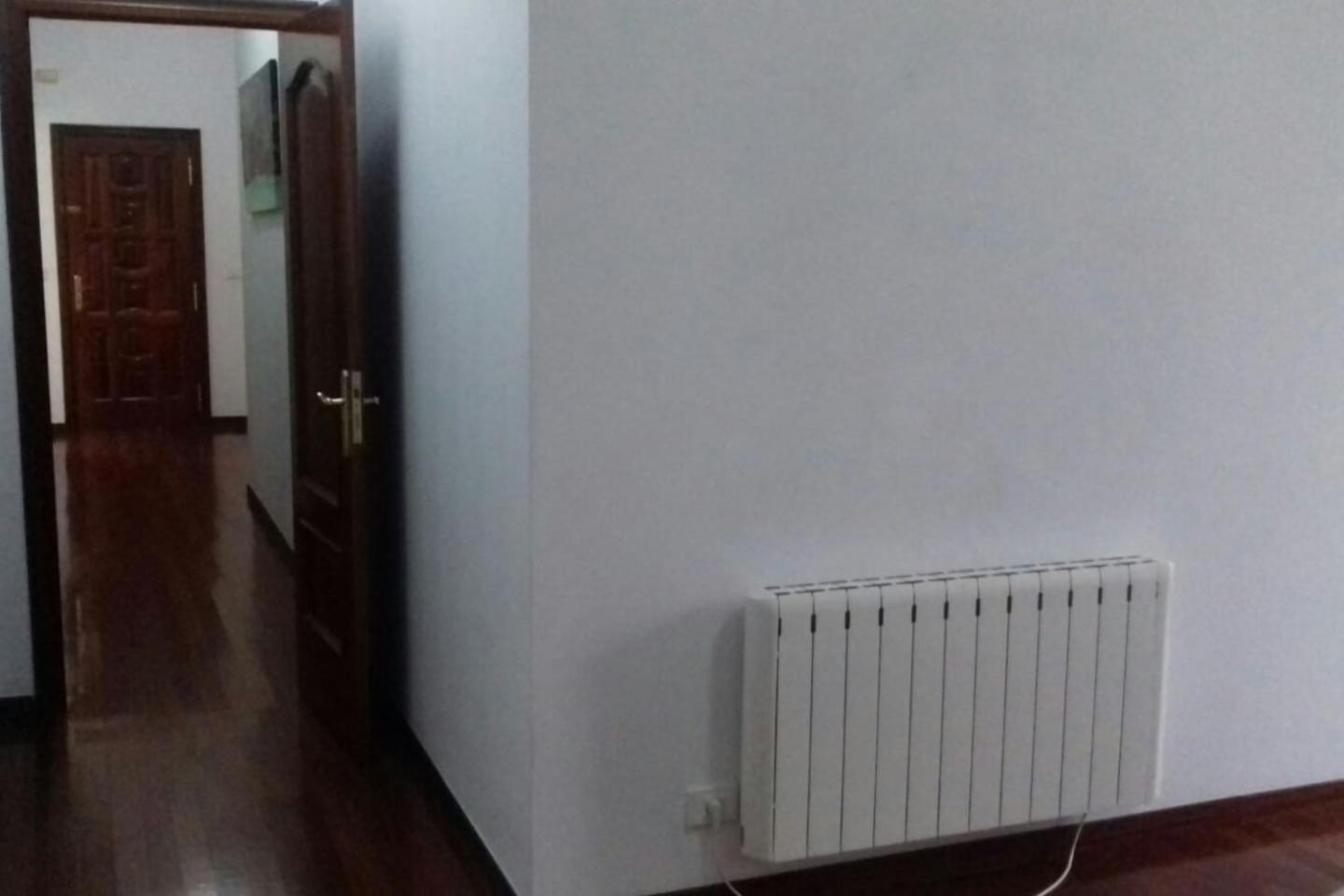 Three-Bedroom Apartment - Photo 63