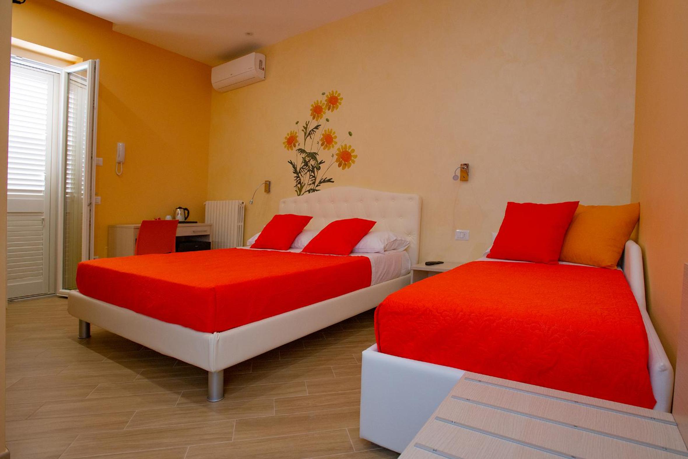 Deluxe Triple Room - Photo 12