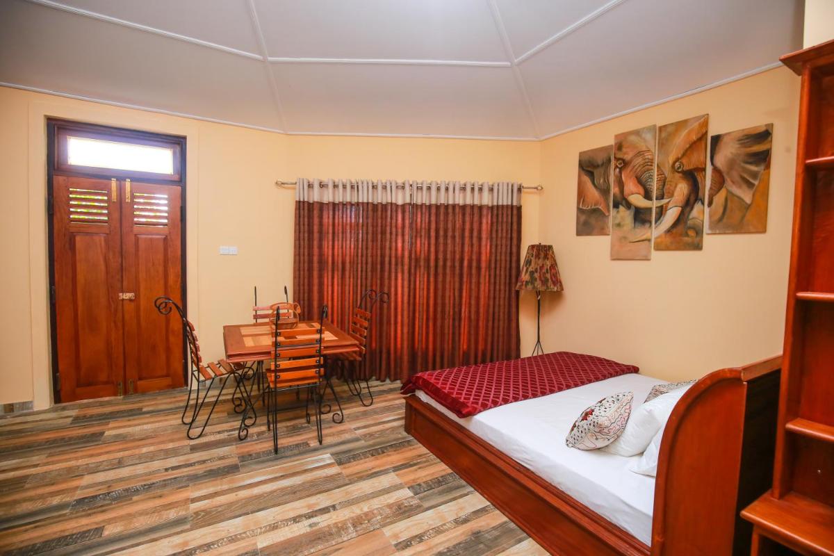 Deluxe Double Room (2 Adults + 1 Child) photo 2