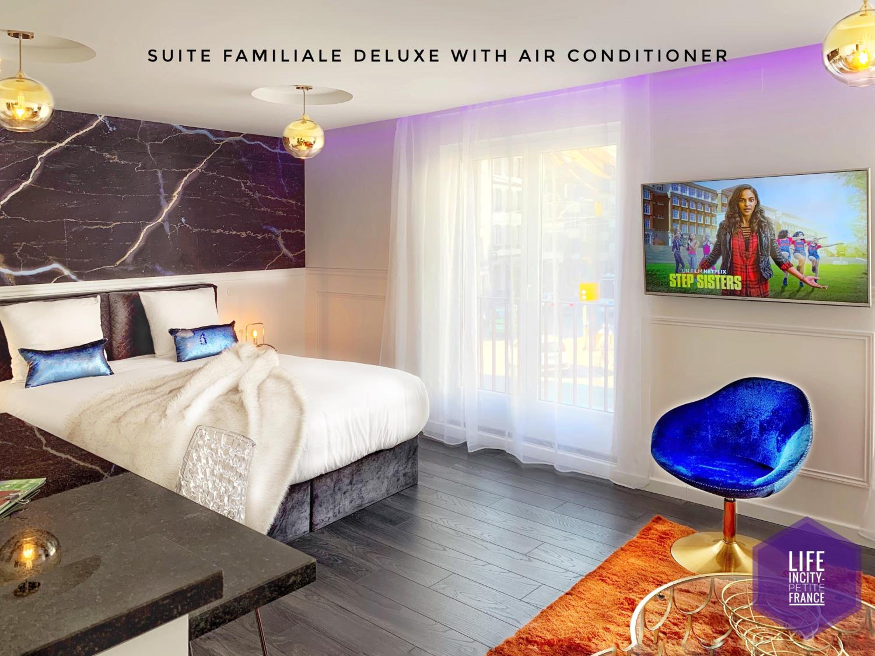 Deluxe Family Suite - Photo 5