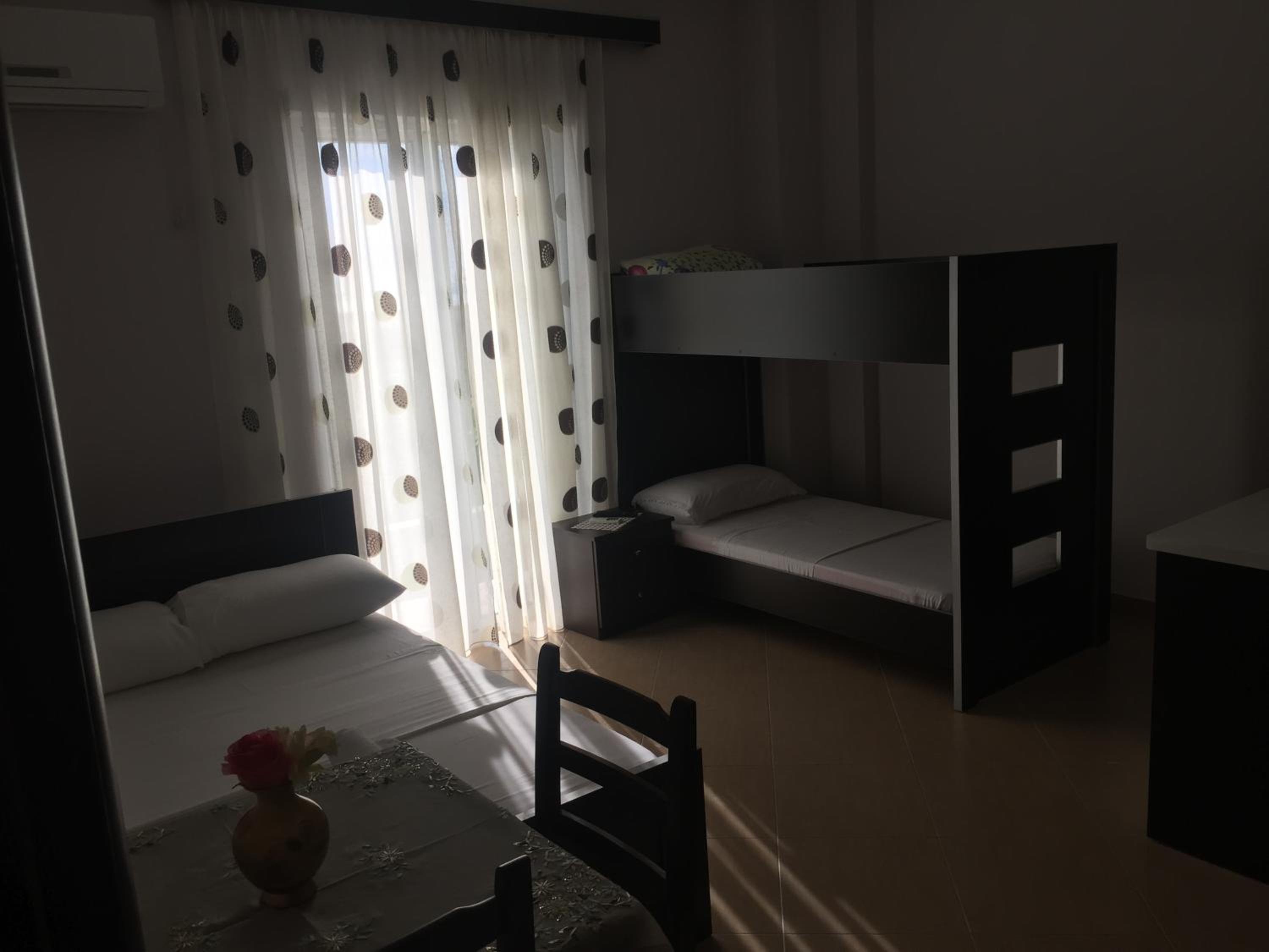 Quadruple Room with Balcony photo 3