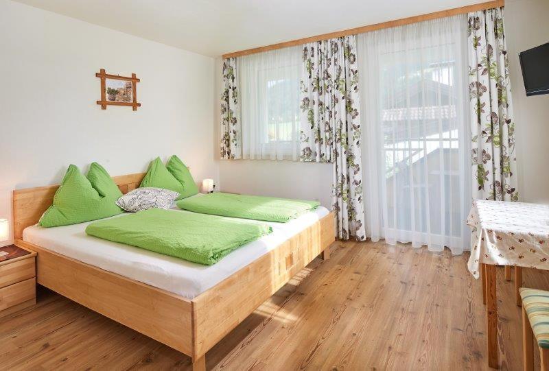 One-Bedroom Apartment with Balcony and Terrace - Photo 12
