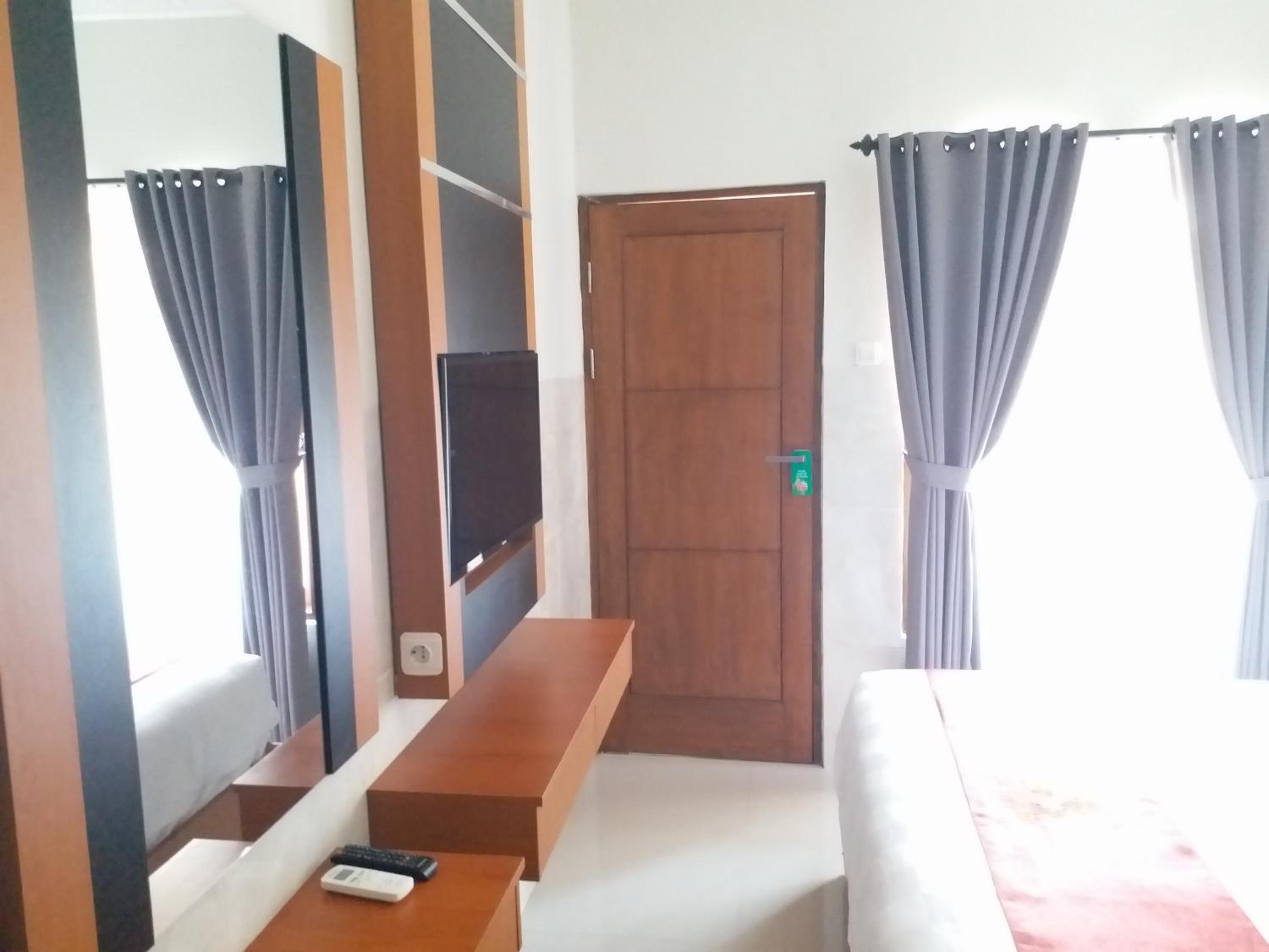 Deluxe Double Room - Photo 17