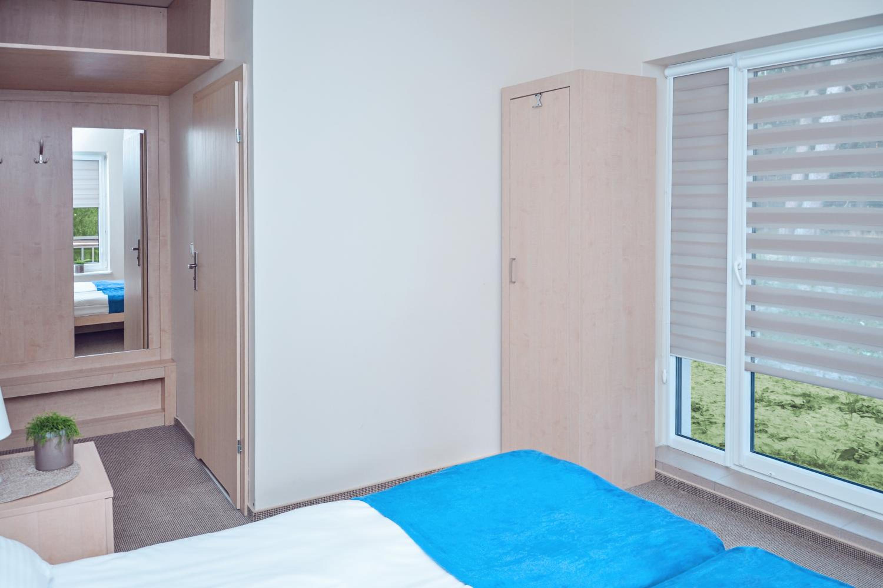 Deluxe Double Room (2 Adults + 1 Child) - Photo 7