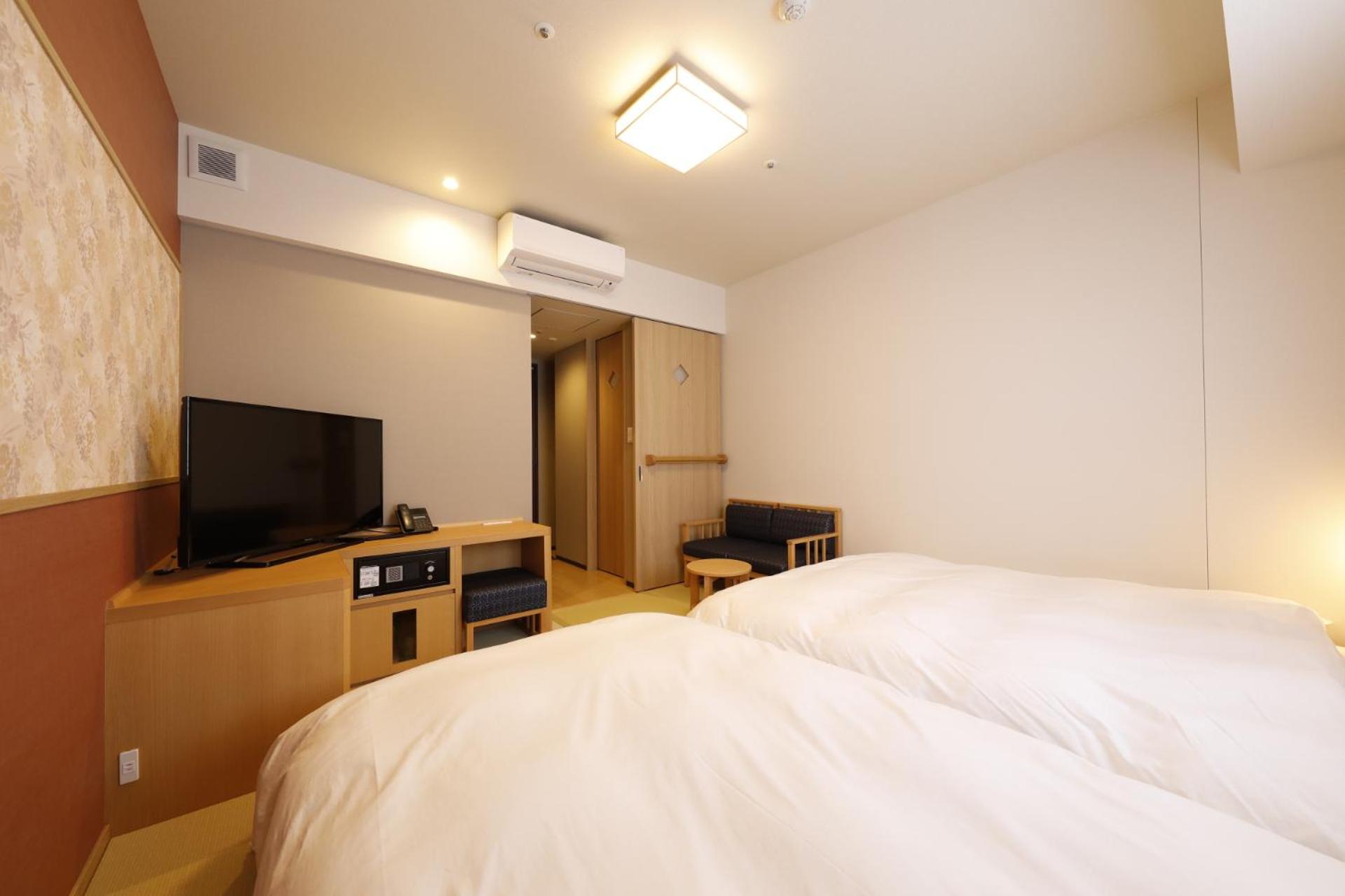 Standard Twin Room - Photo 1