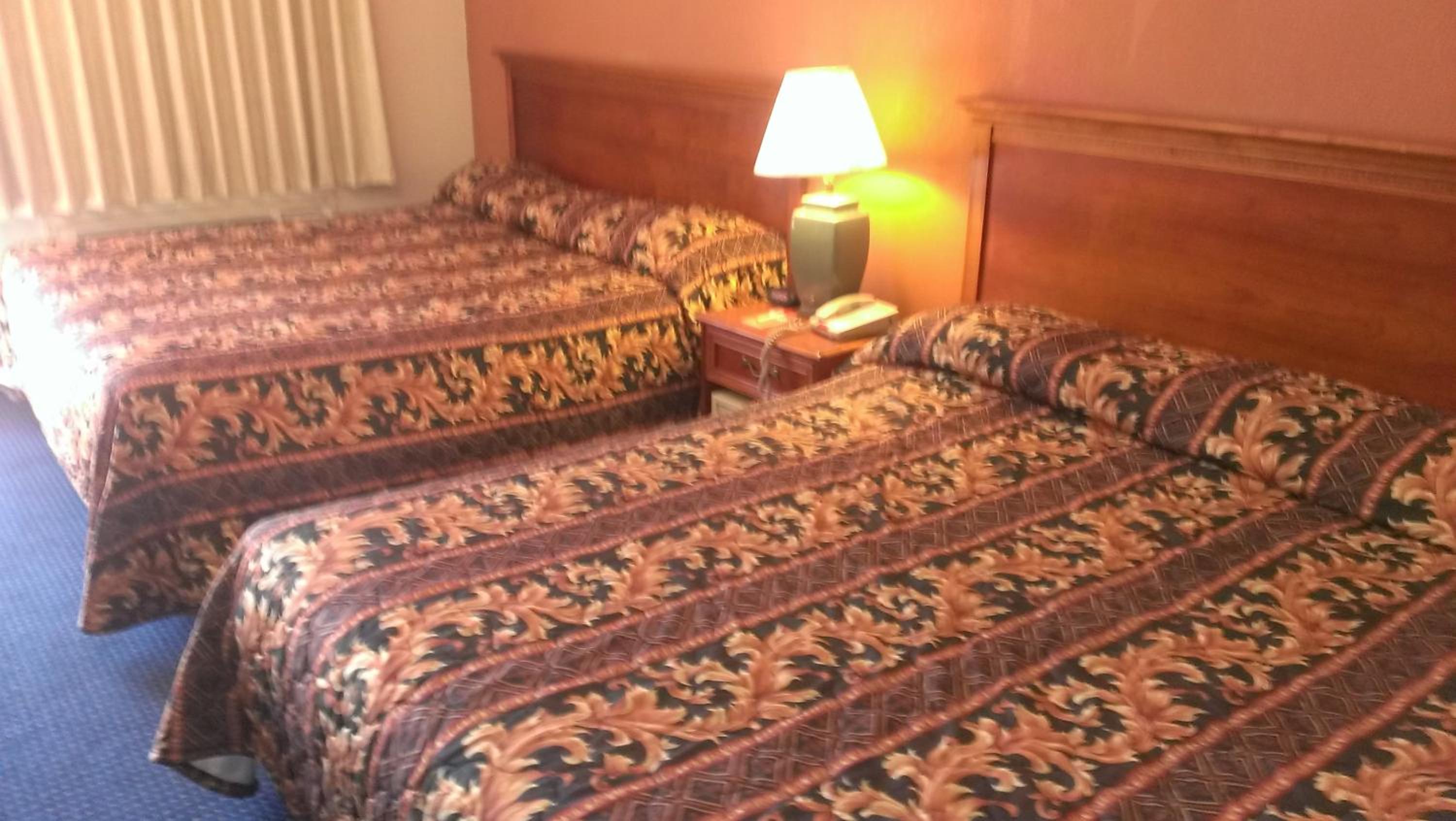 King Room with Two King Beds - Smoking - Photo 3