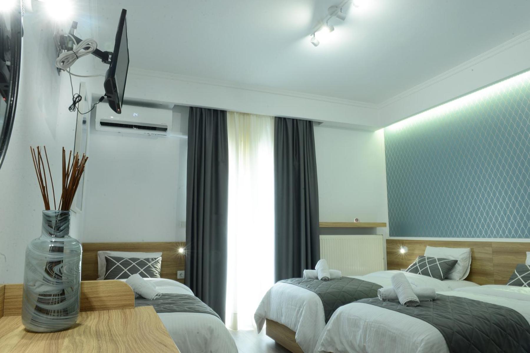 Standard Triple Room - Photo 9