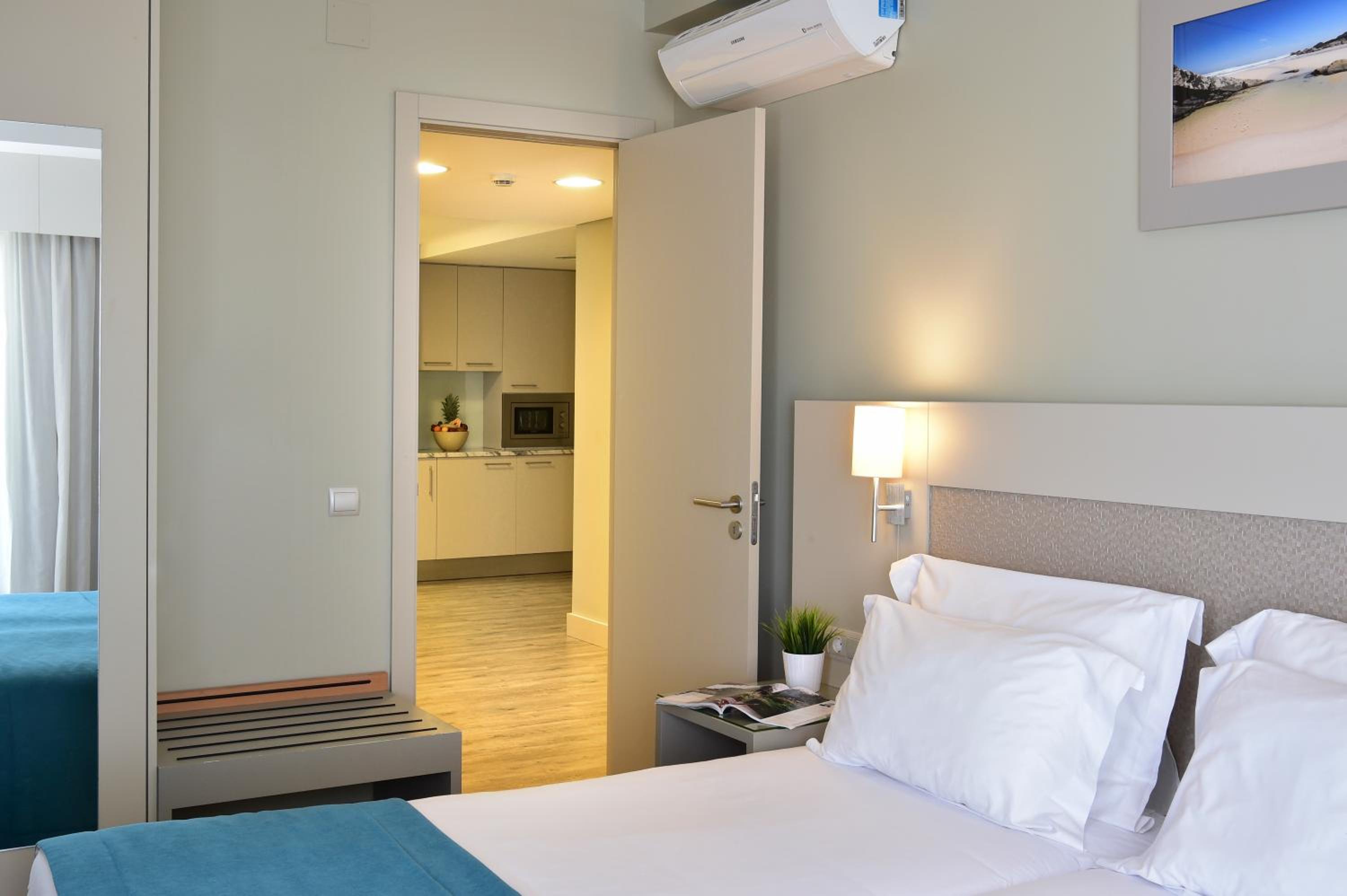 Premium Two-Bedroom Apartment with Balcony and Pool View - Photo 1