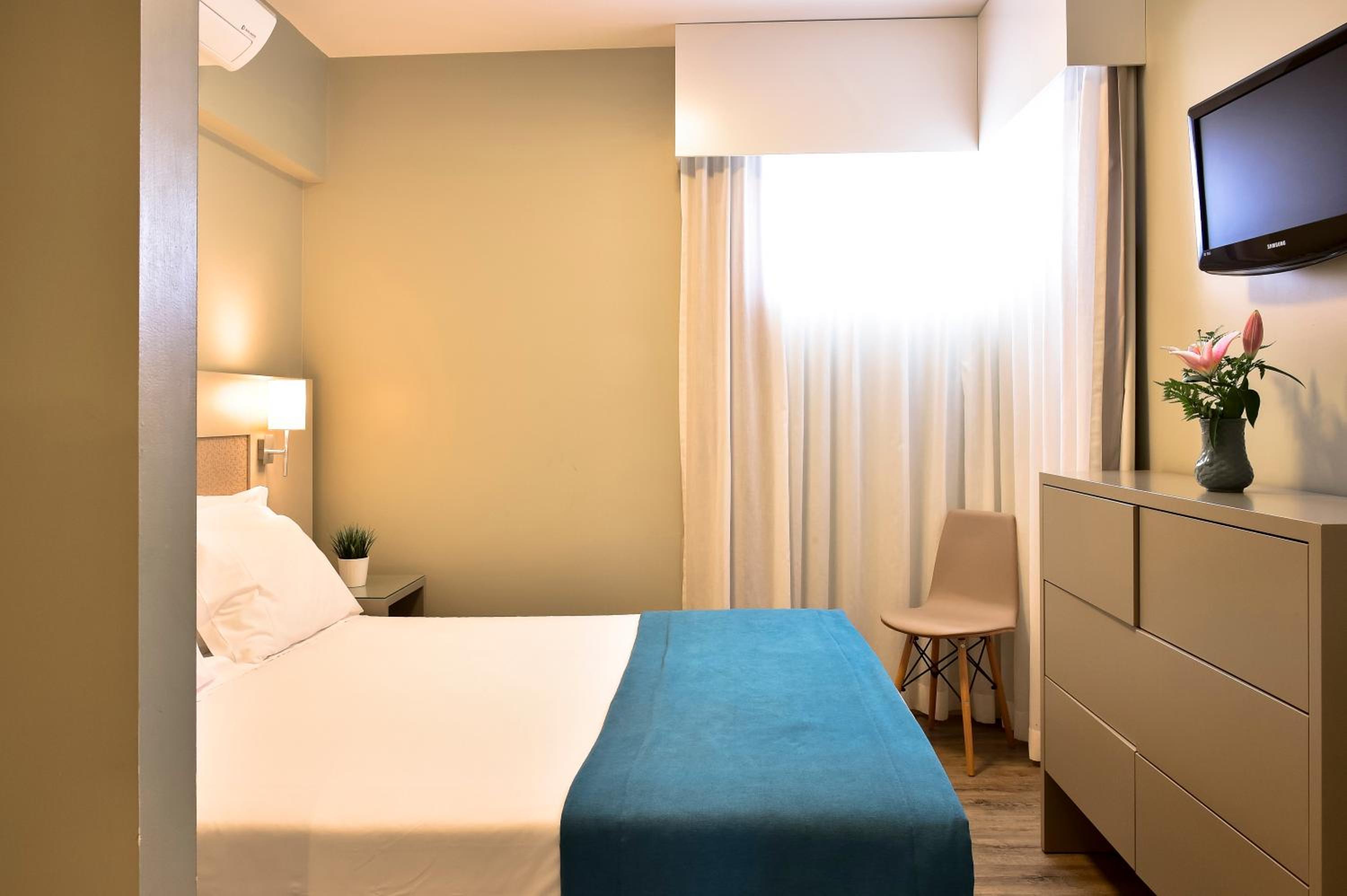 Premium One-Bedroom Apartment with Balcony and Pool View - Photo 1