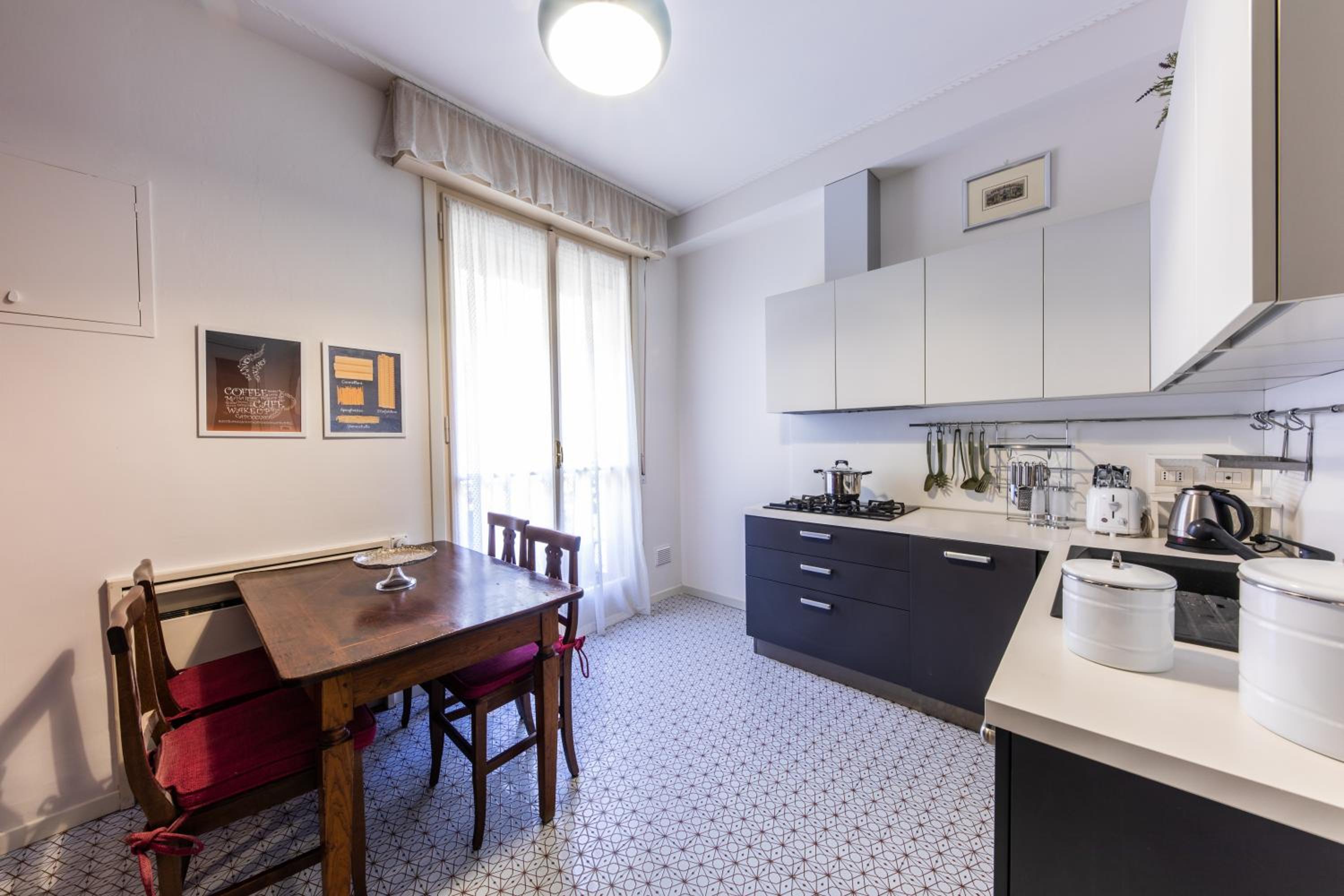 Three-Bedroom Apartment - Photo 2
