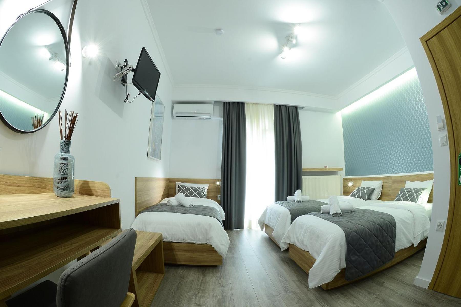 Standard Triple Room - Photo 8